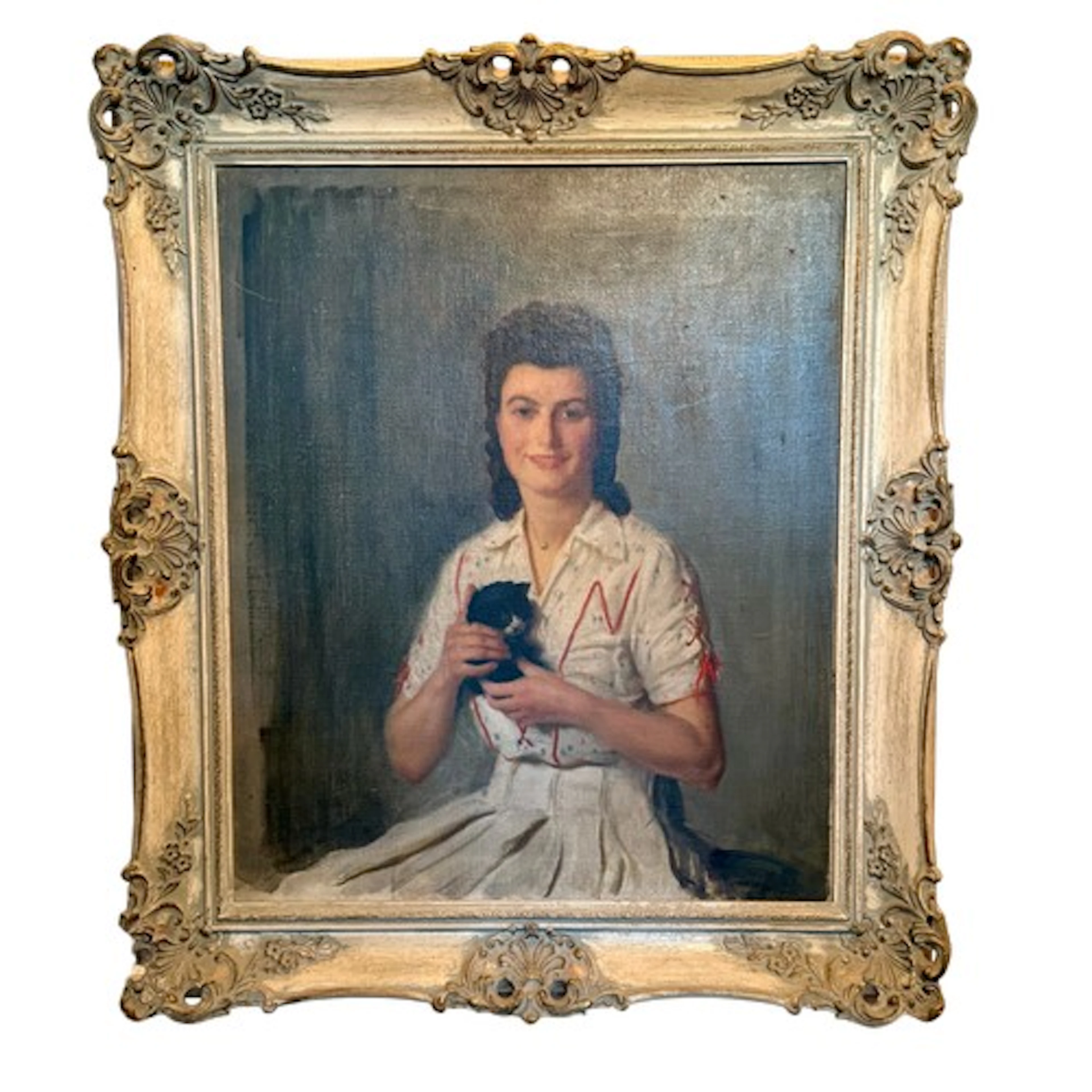 Unsigned oil on canvas portrait of a girl with a kitten beli...