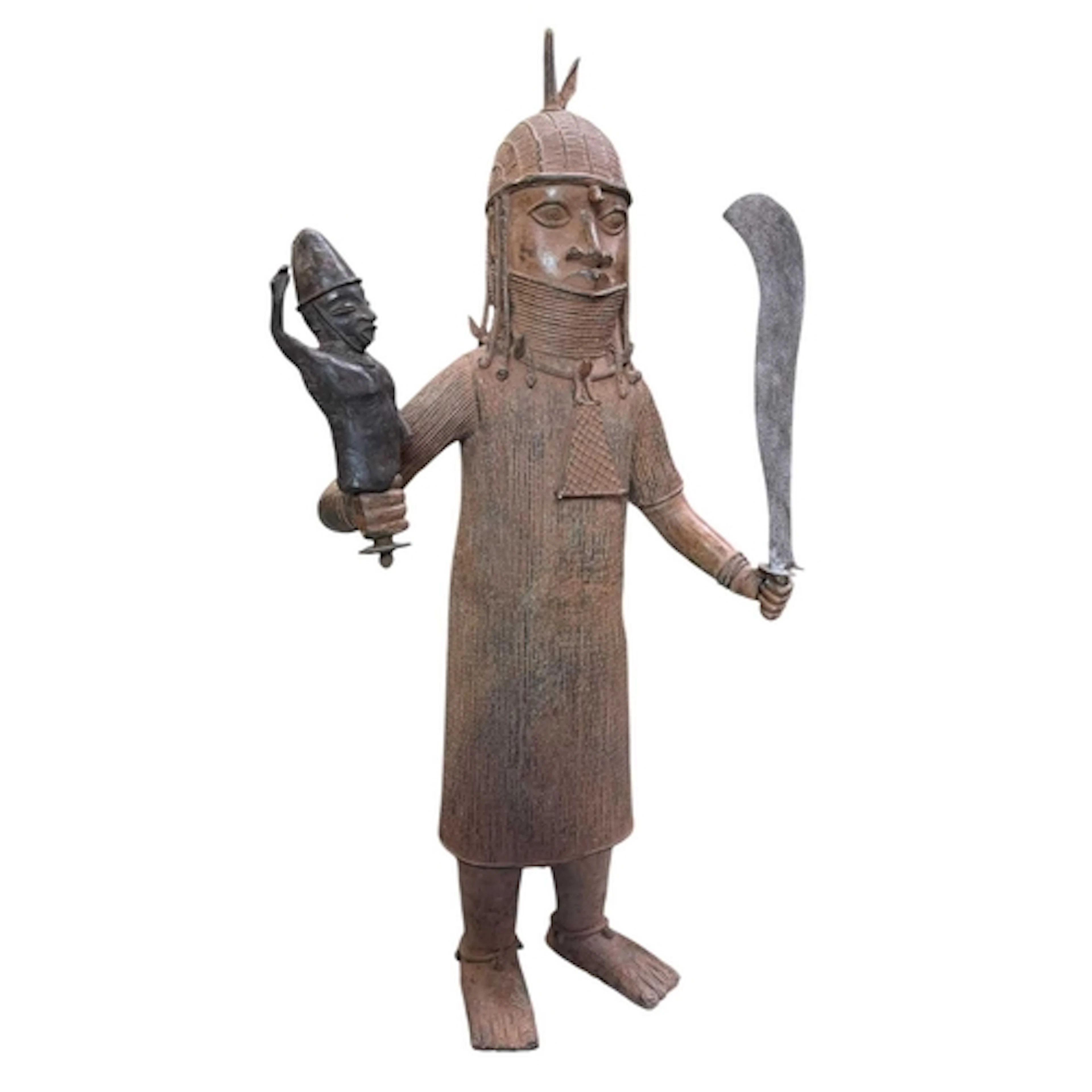 A large floor Benin style bronze statue of a warrior. The fl...