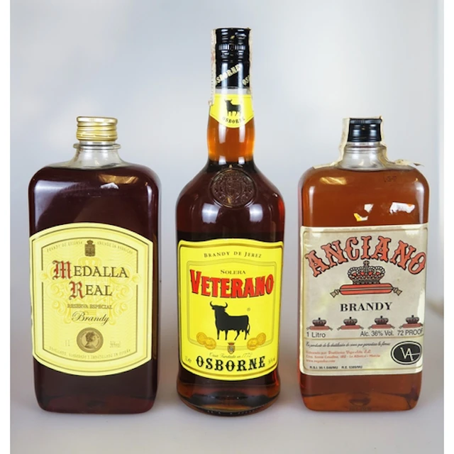Three 1 Litre bottles of Spanish brandy including Angiano Br...