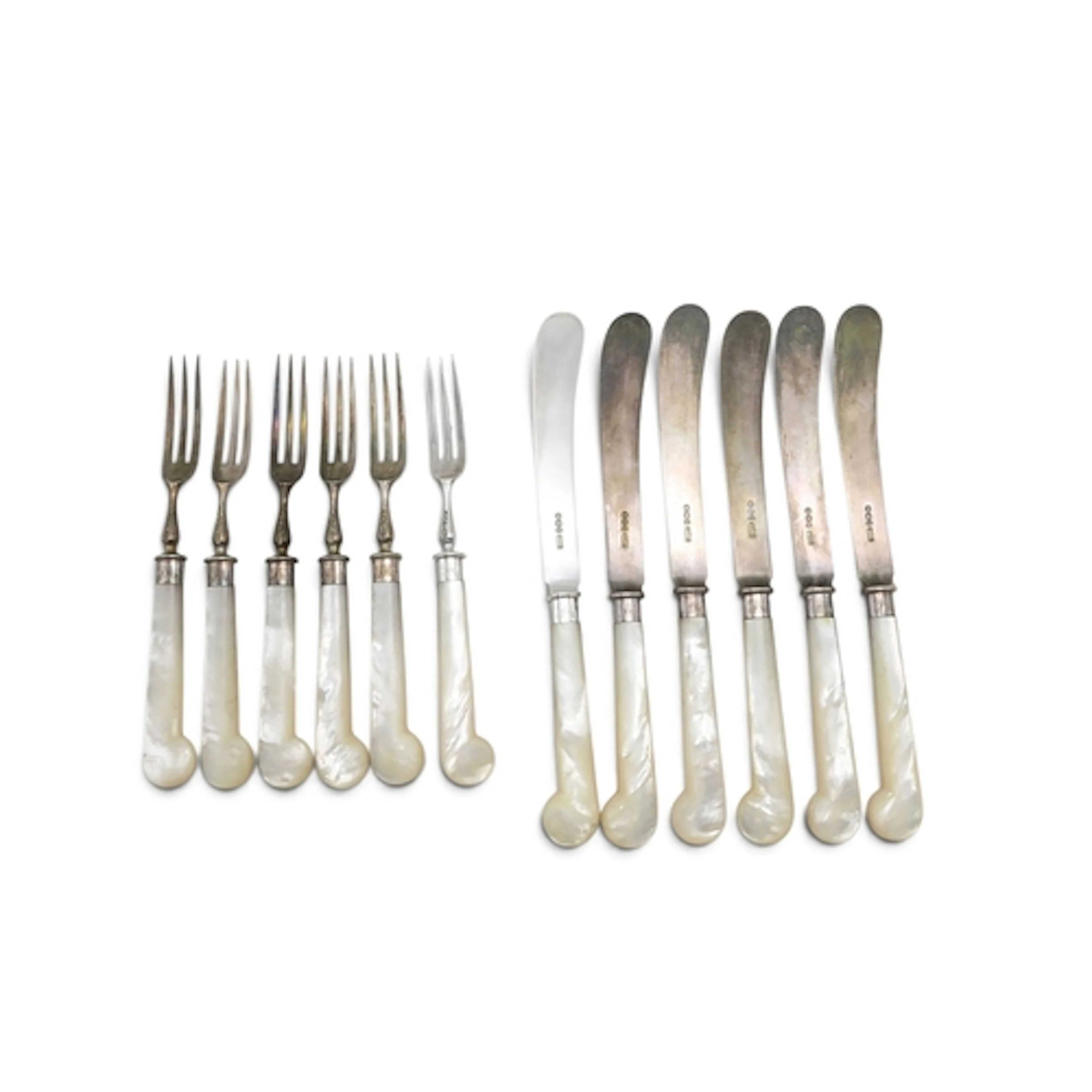 A late-Victorian six-place setting of silver dessert knives ...