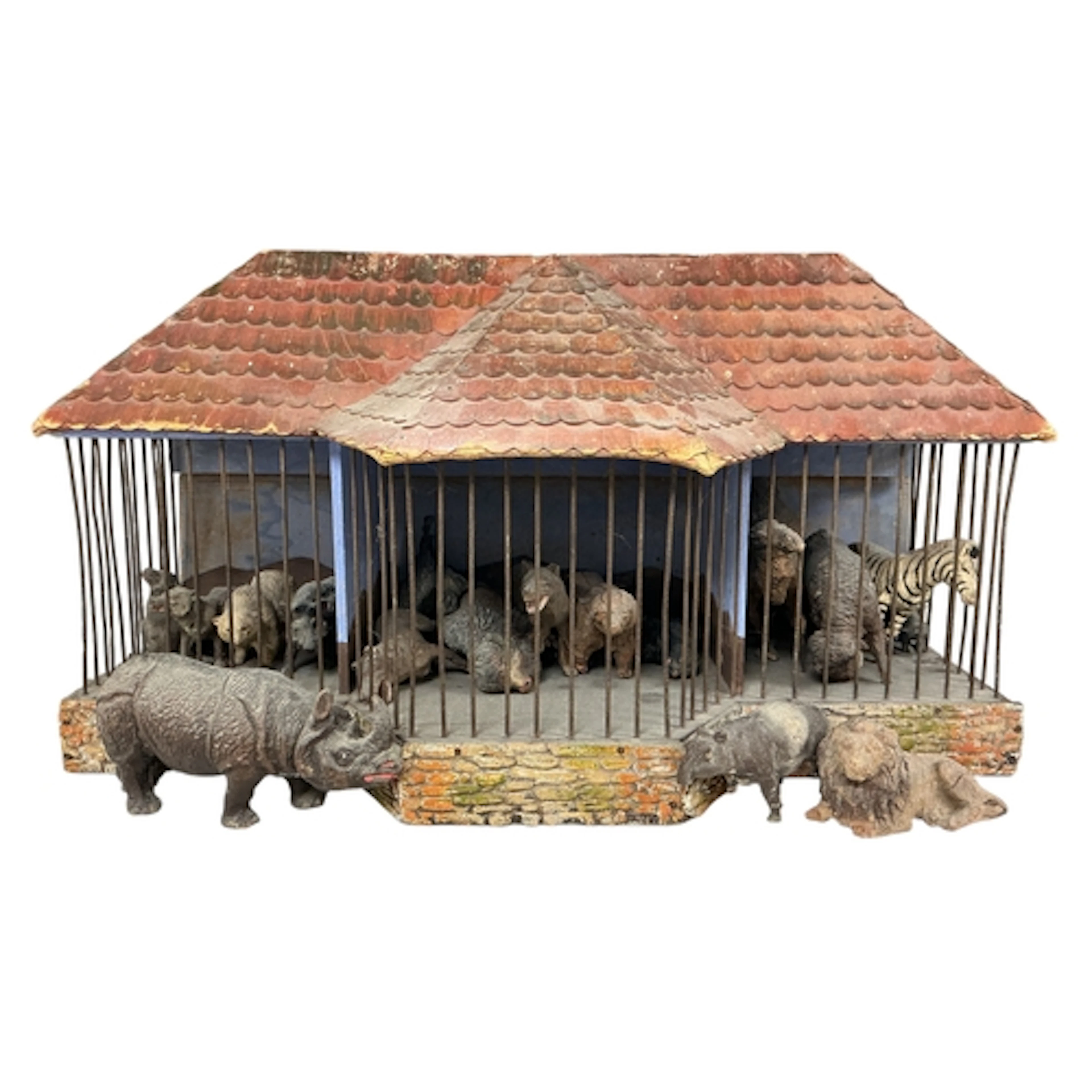 An early 20th century German painted wood and wirework toy z...