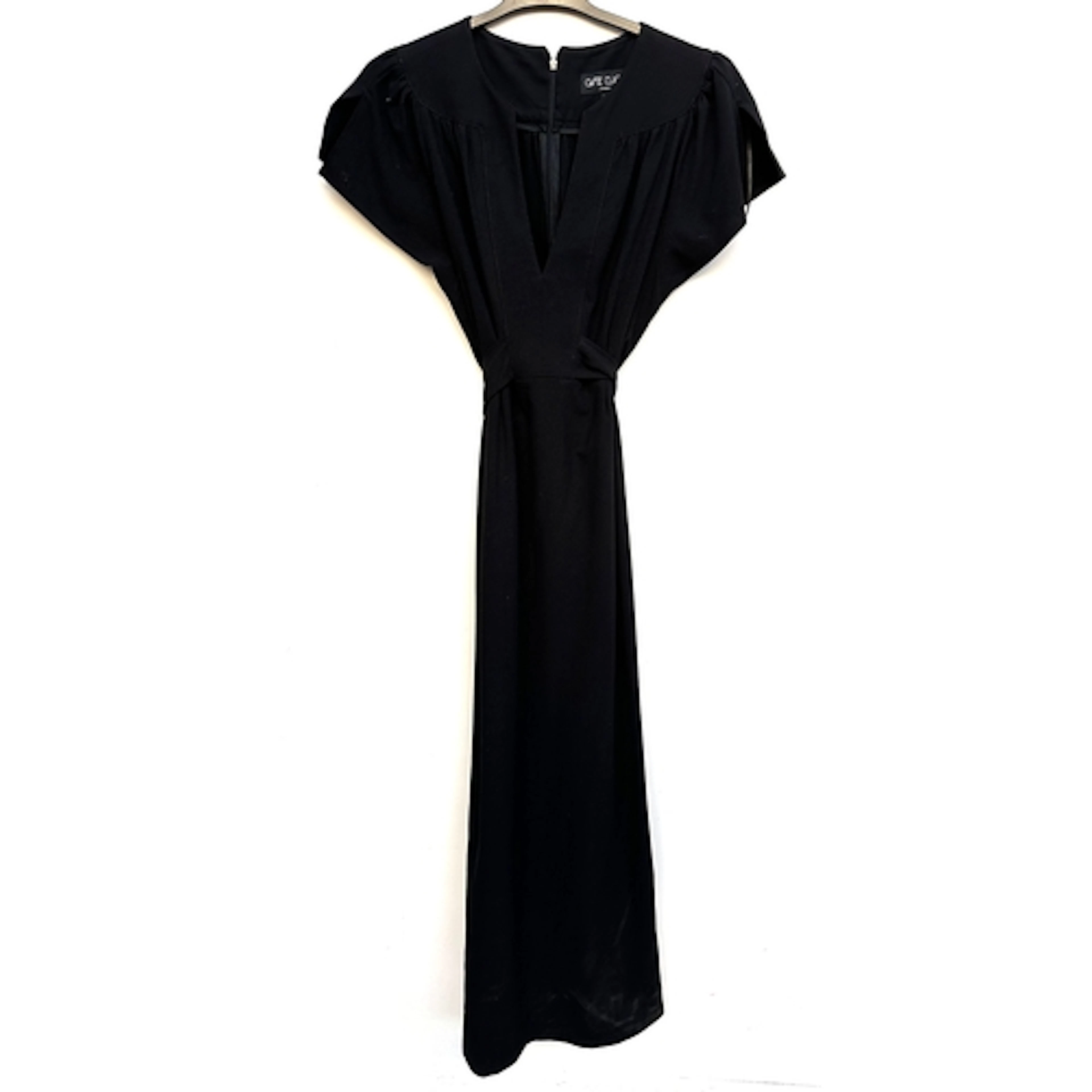 An Ossie Clark black dress with V neck and tie back, size 16