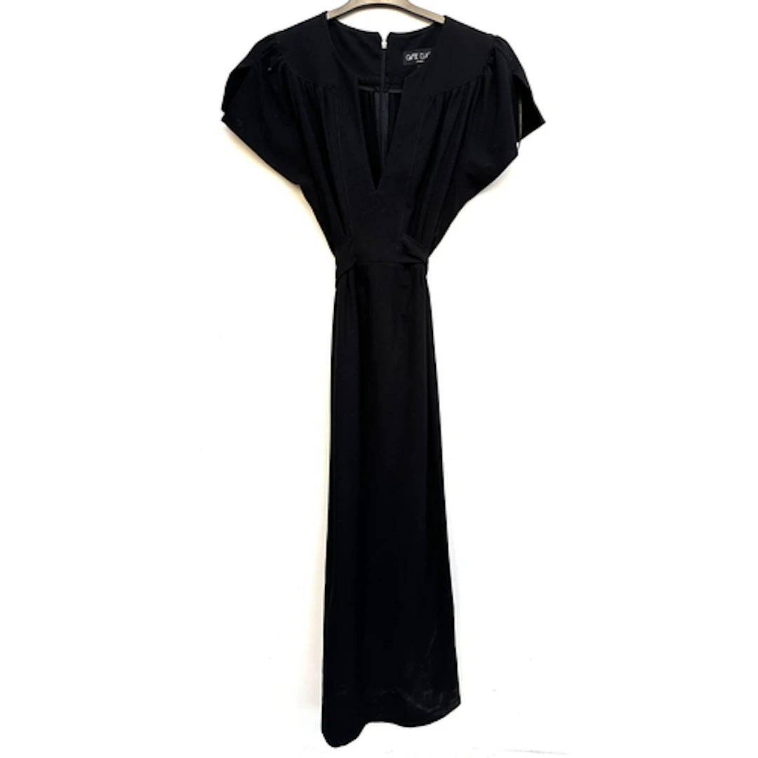 An Ossie Clark black dress with V neck and tie back, size 16