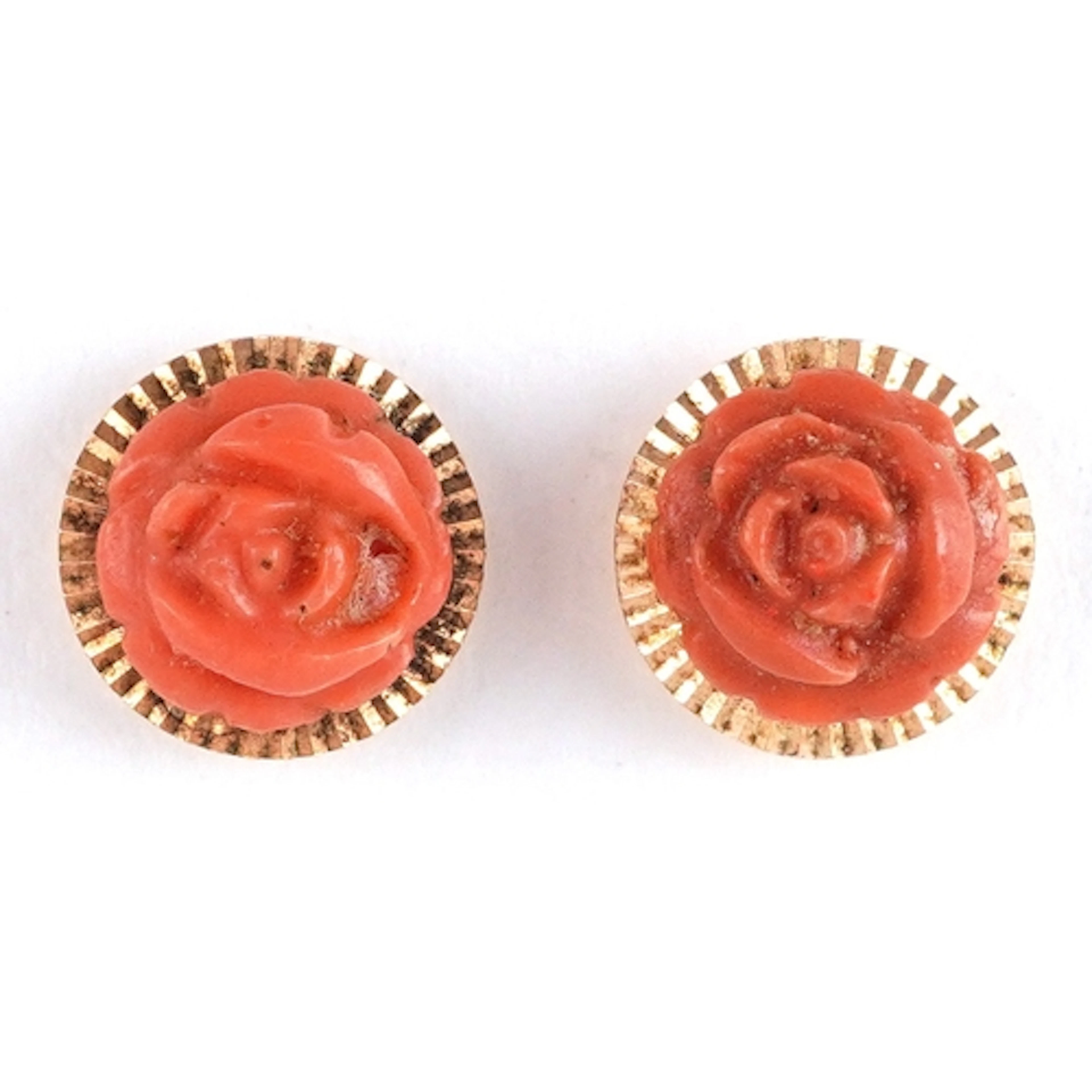 Pair of yellow metal coral coloured stud earrings, 7.7mm in ...