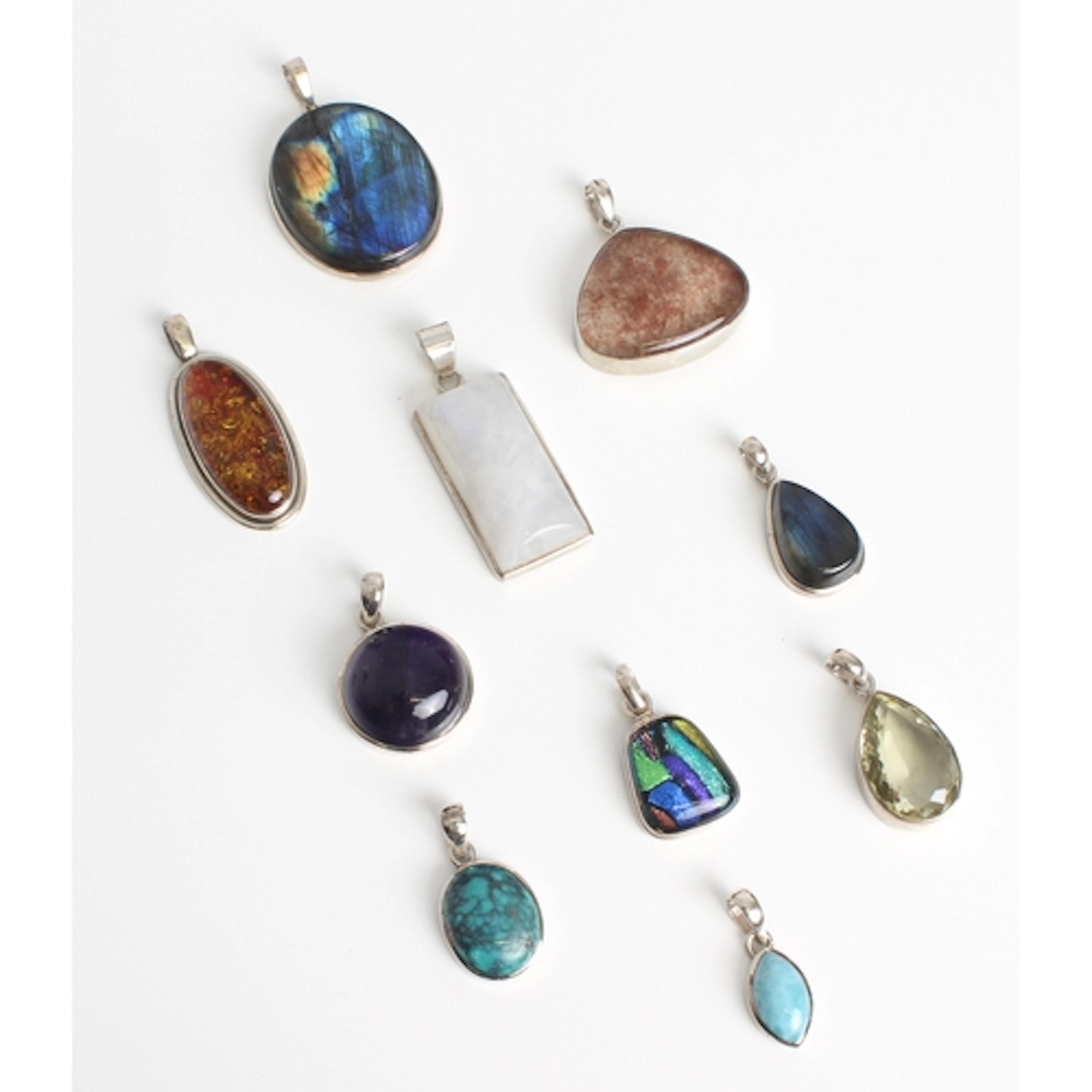 Ten mixed gemstone and sterling silver pendants - including ...
