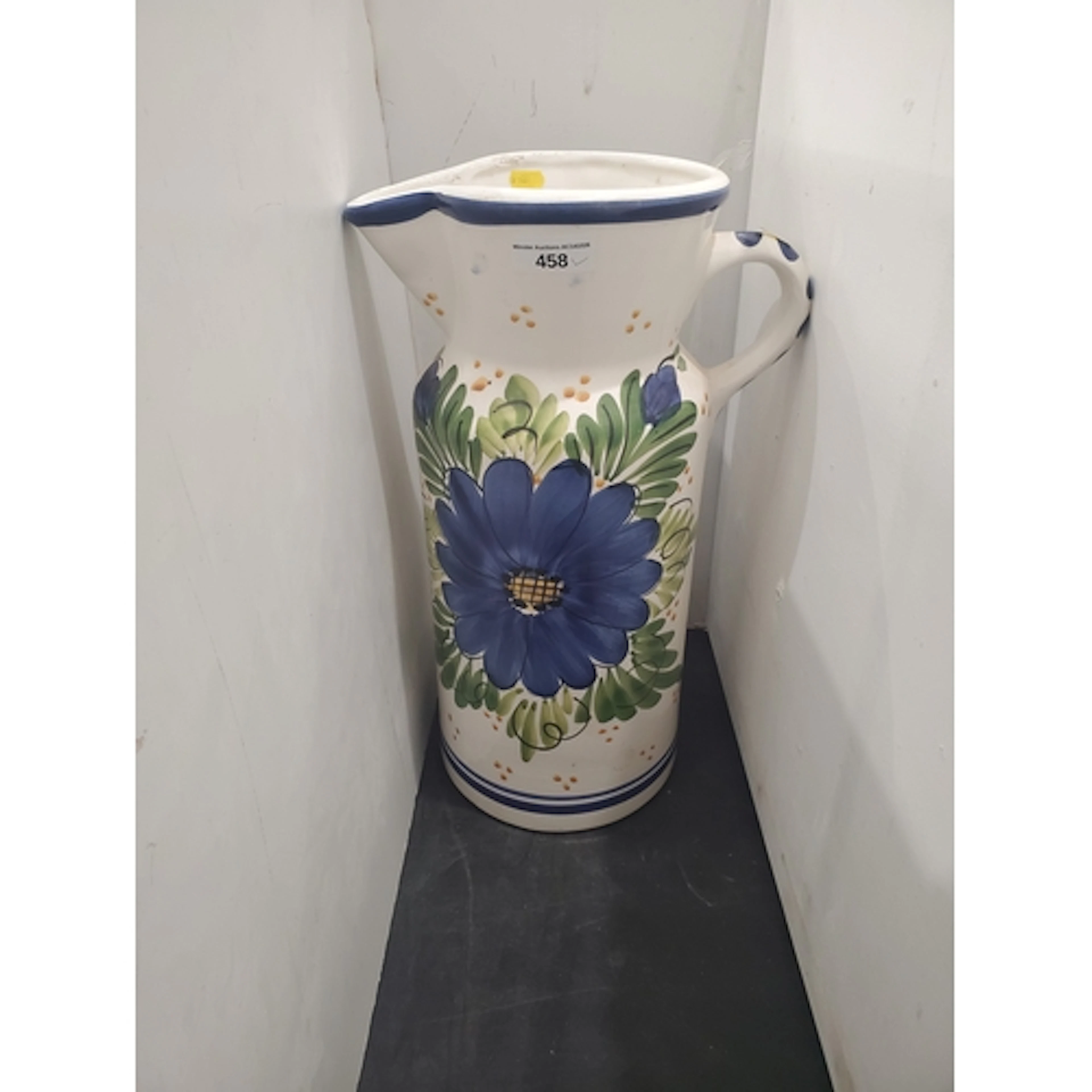 A large delft style Jug painted with flowers 1ft 6in H (R5)