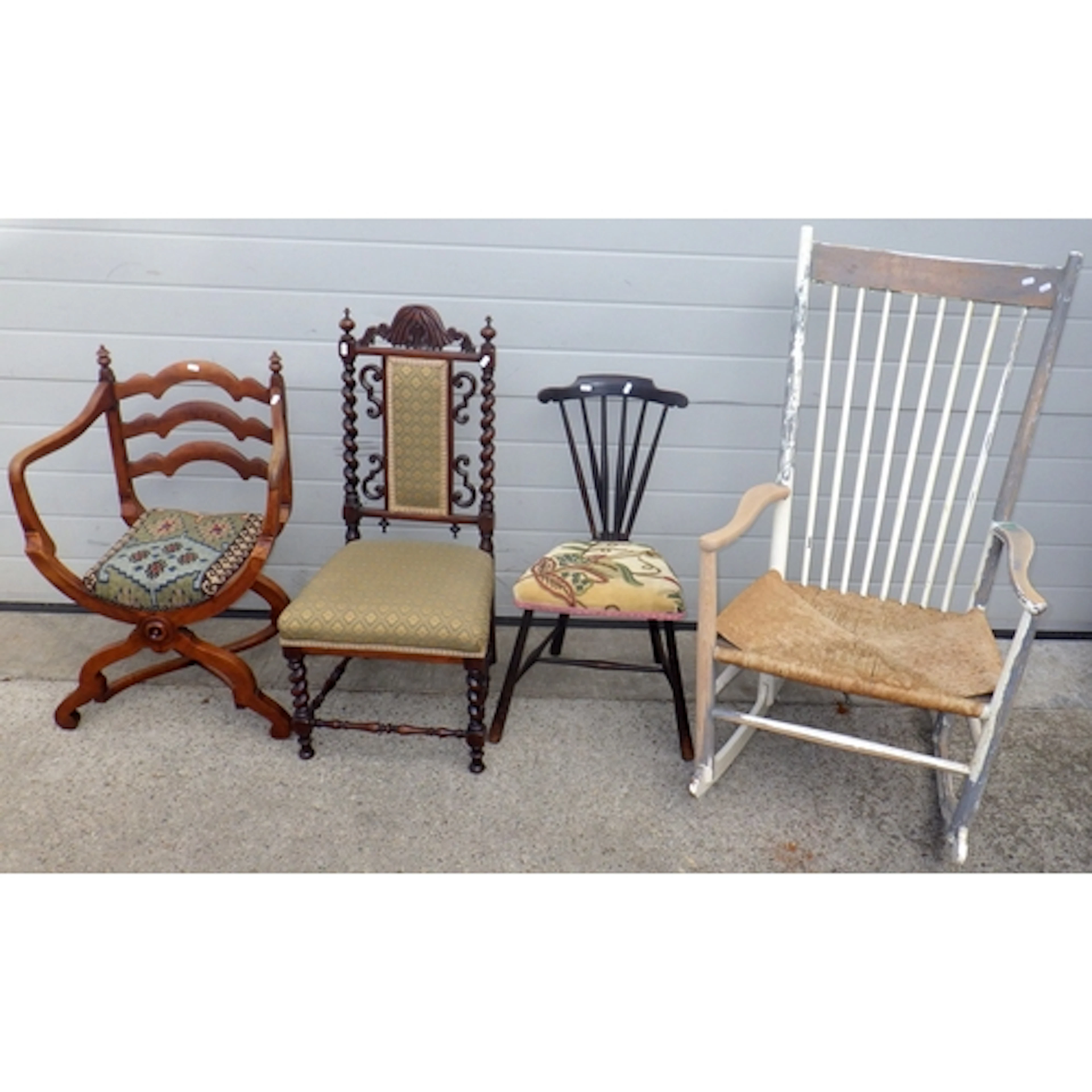 A rocking chair, X frame chair, two further chairs (4)