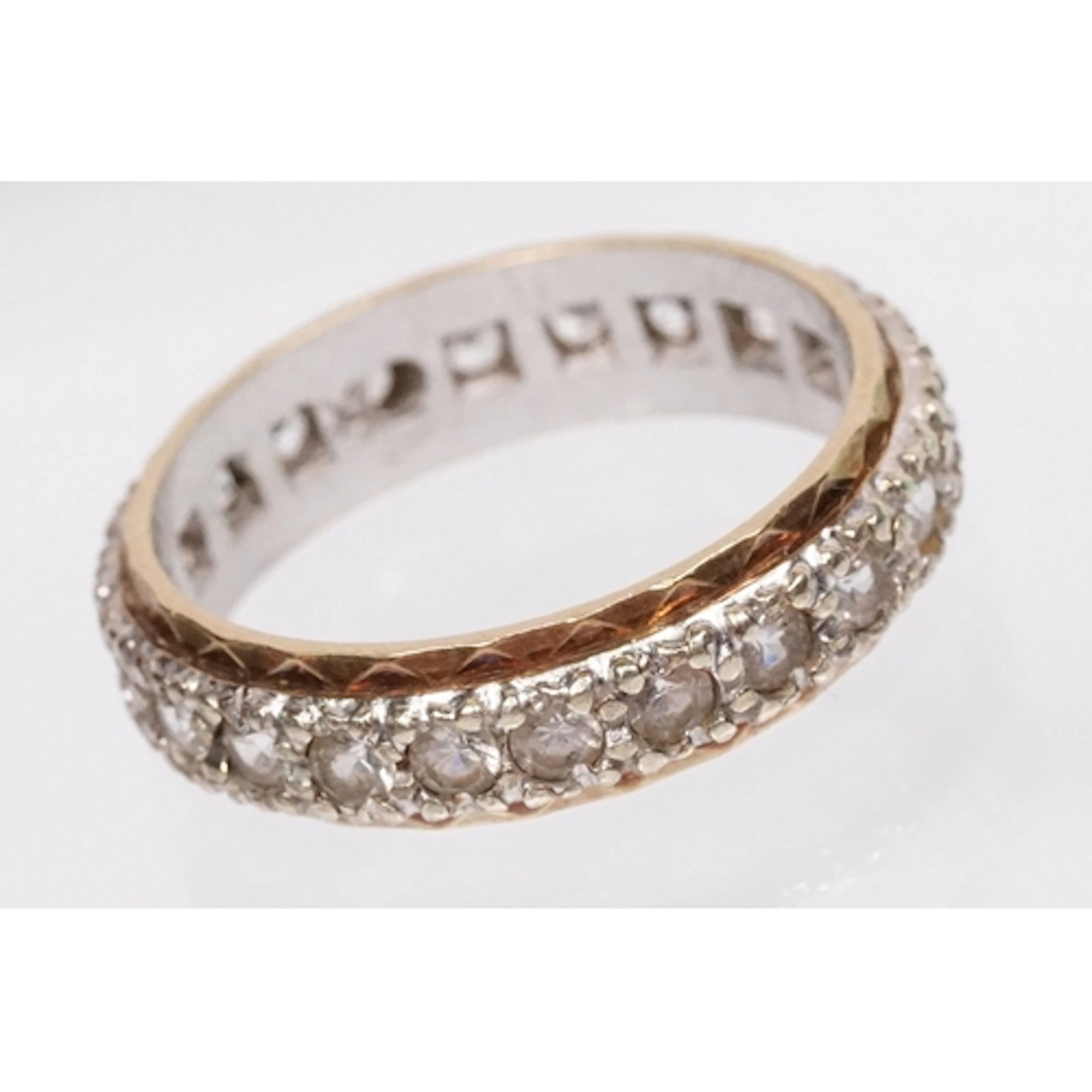Two tone 9ct gold and white sapphire eternity ring. Hallmark...