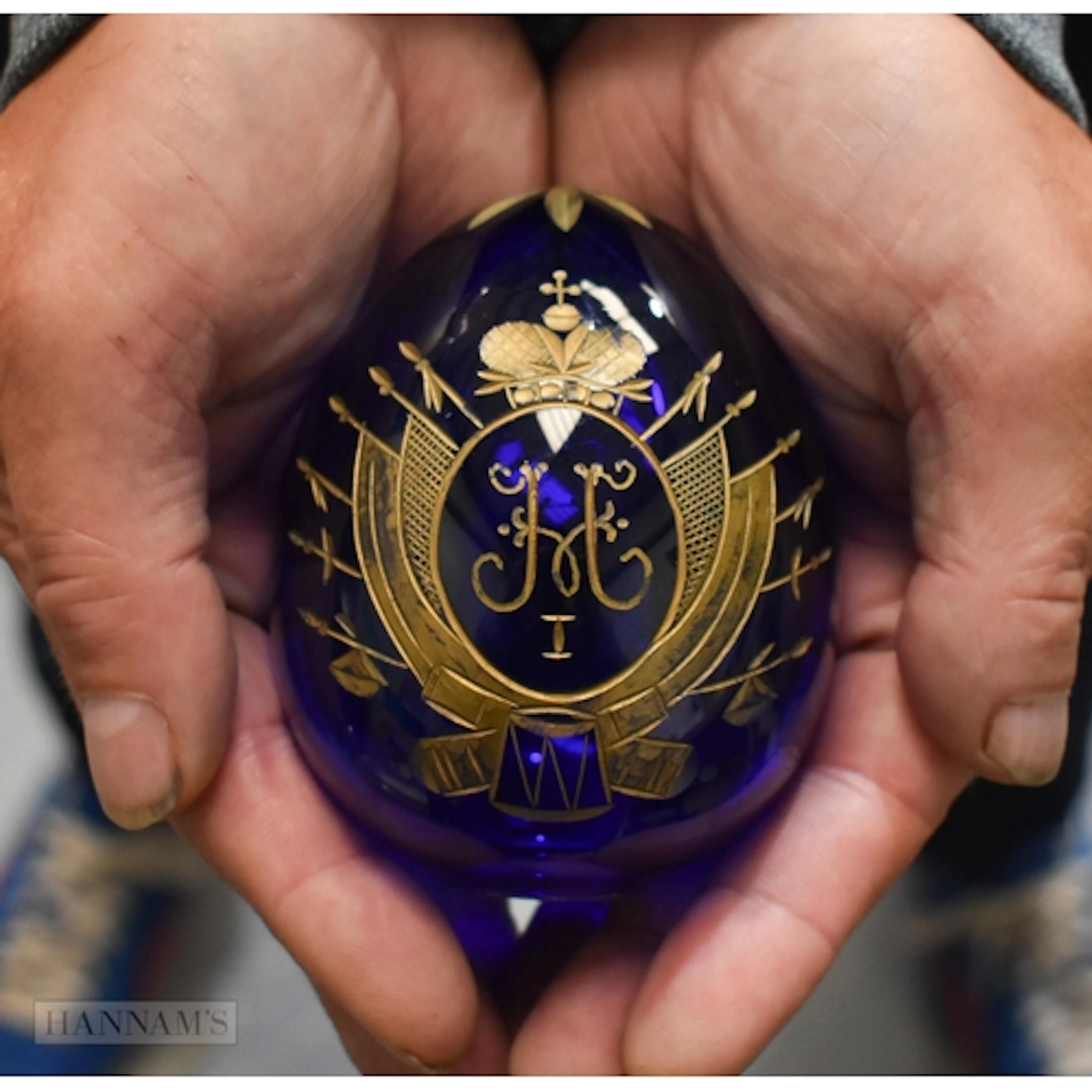 A RUSSIAN IMPERIAL BLUE GLASS DOUBLE EAGLE EASTER EGG. 10 cm...