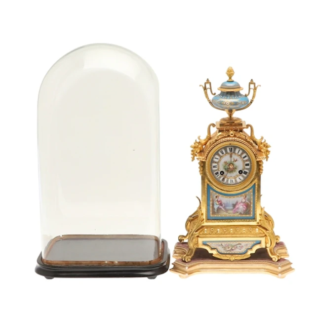 A FRENCH JAPY FRERES ORMOLU AND PORCELAIN MANTEL CLOCK. late...