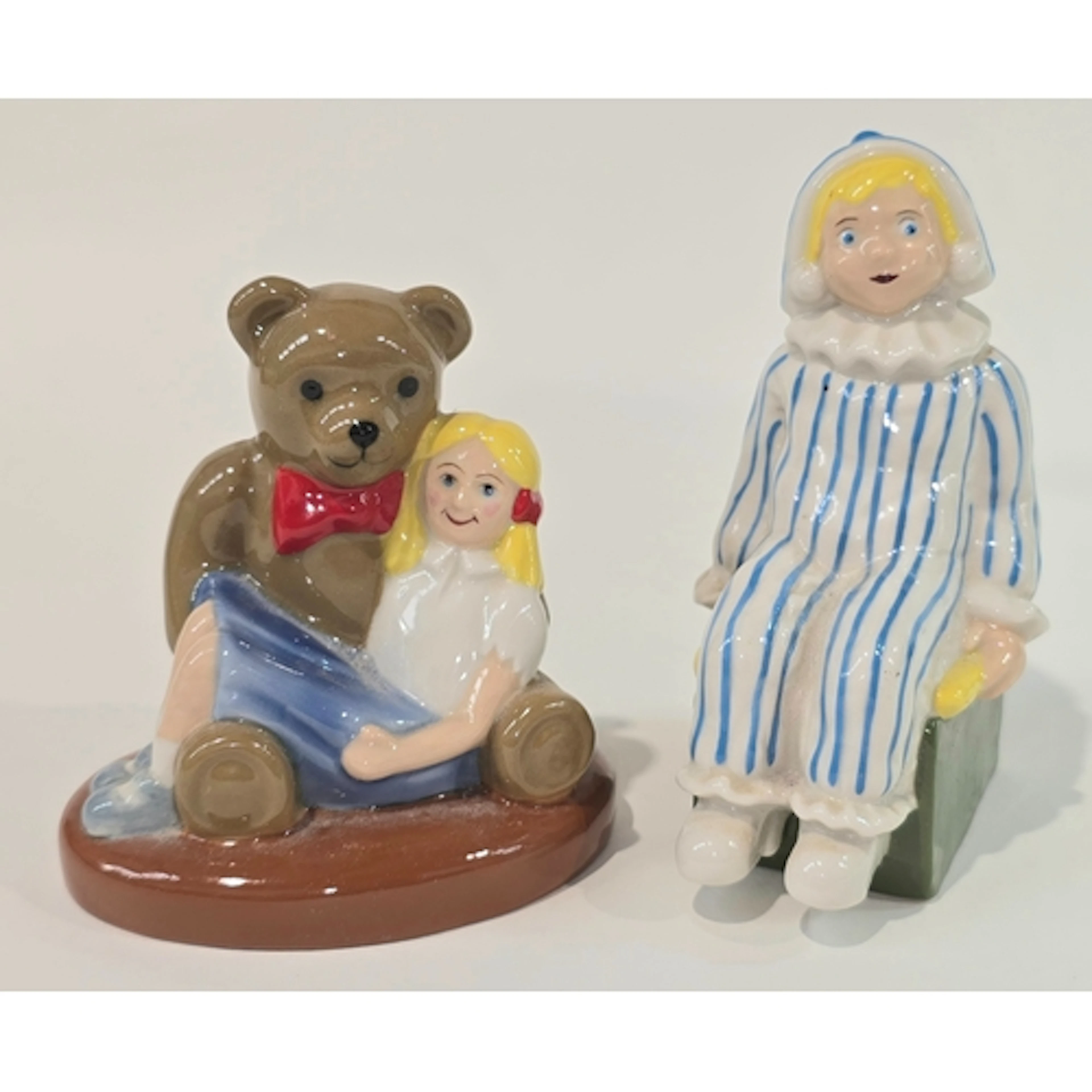 A pair of Wade limited edition figurines to include Andy Pan...