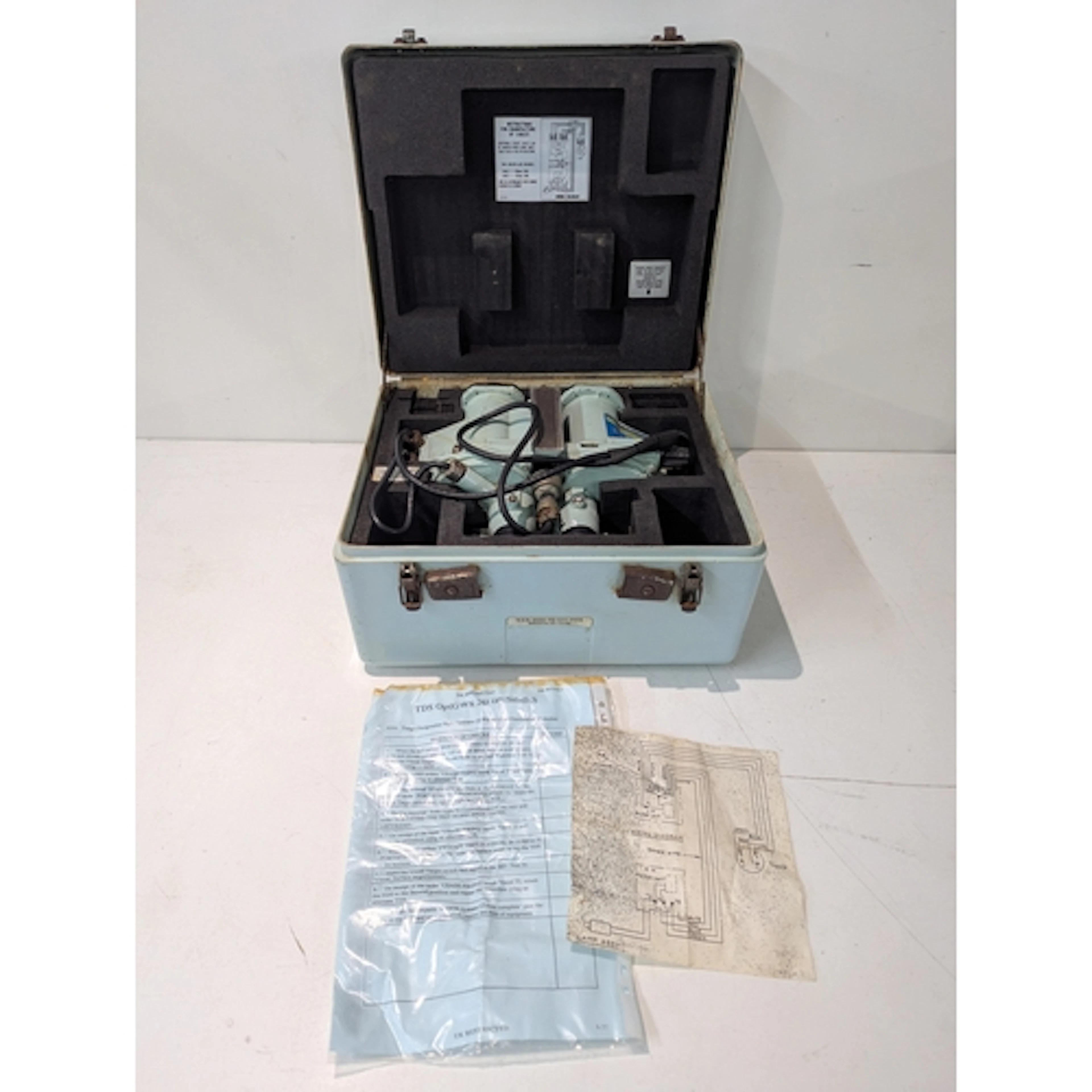 A pair of cased Target Detection sight operator binoculars f...