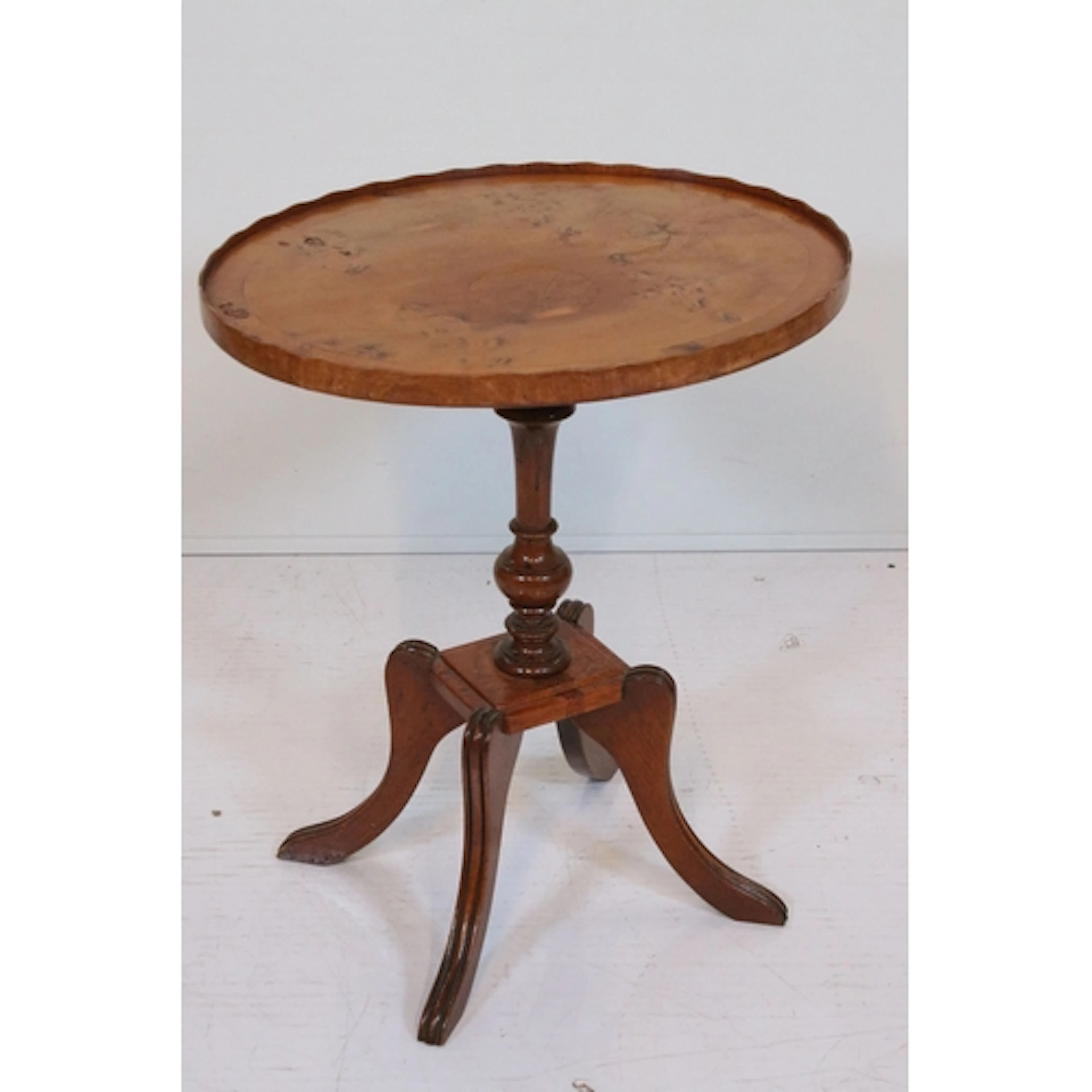 Reproduction yew wood wine table, having shaped oval top on ...