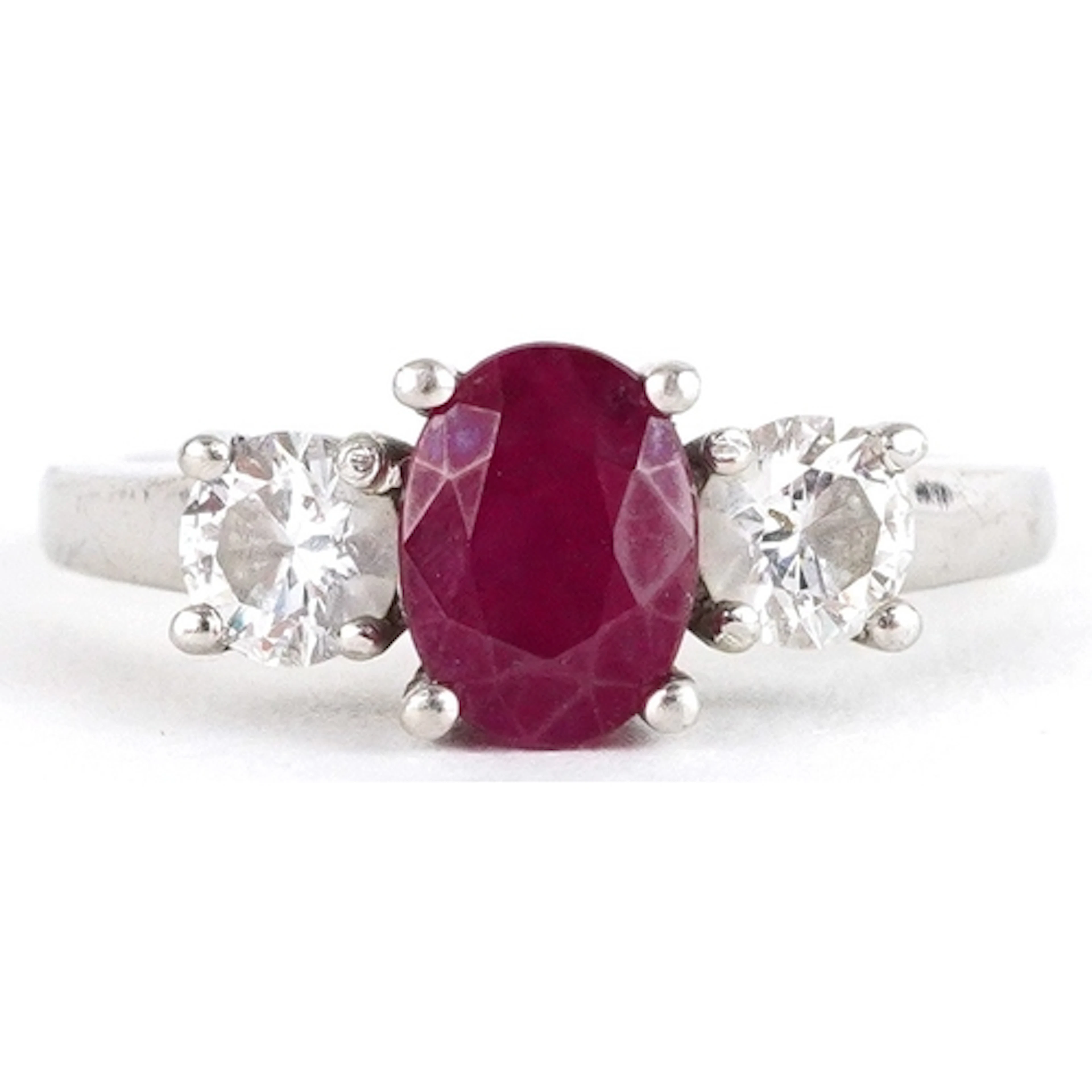 Platinum, diamond and ruby trilogy ring, total diamond weigh...