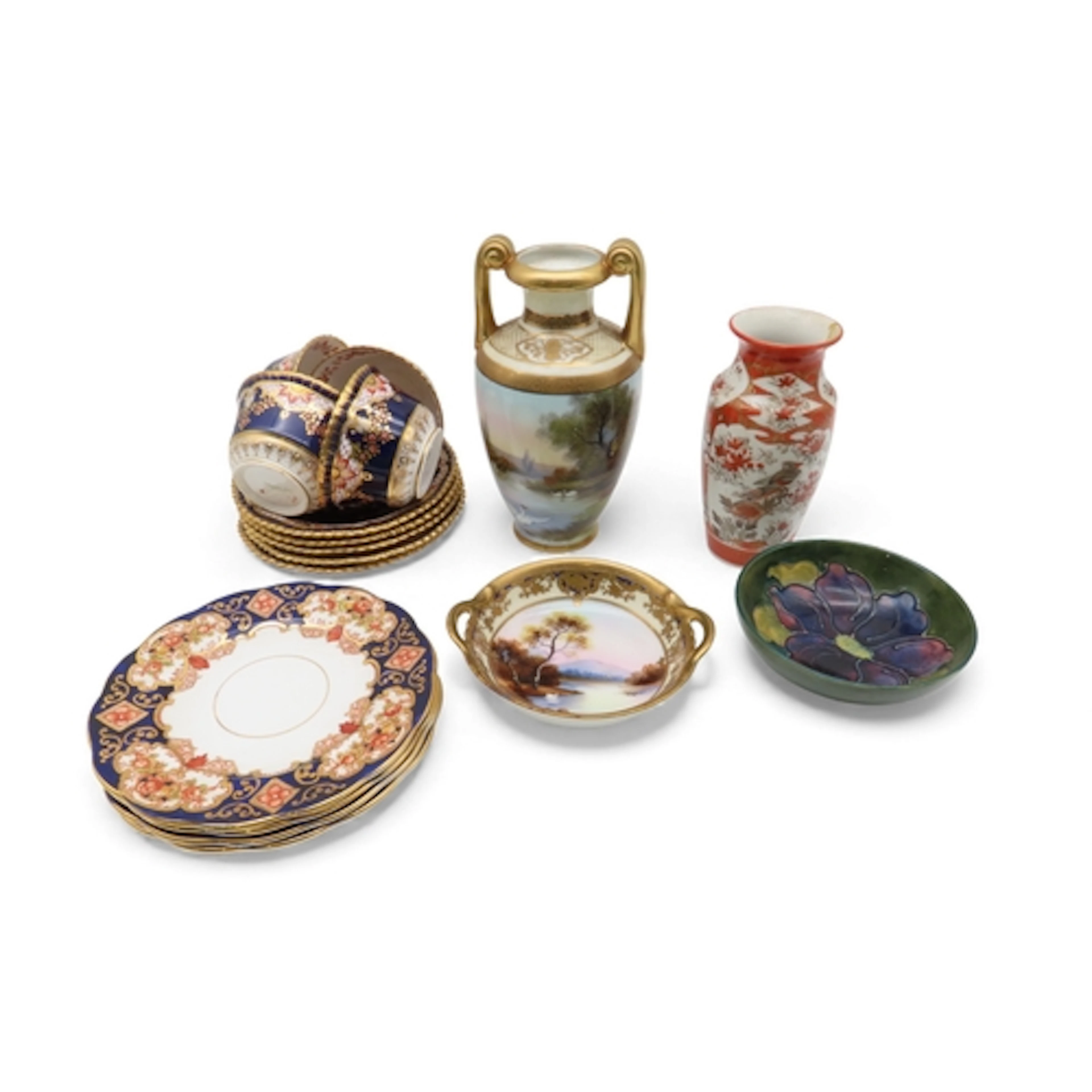 Four Copeland China cups, five saucers, four Royal Albert He...