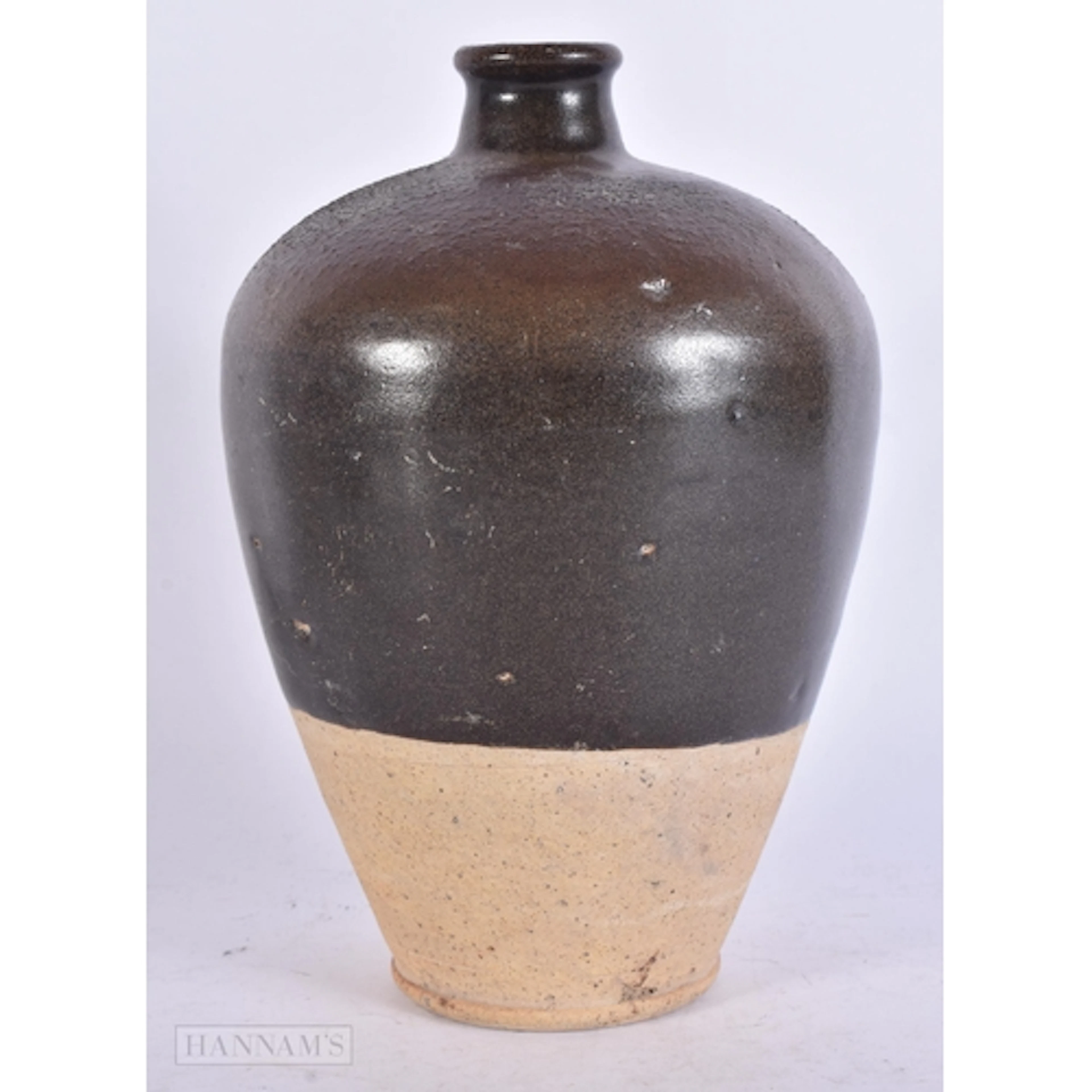 A CHINESE TANG DYNASTY BROWN GLAZED POTTERY VASE (AD 618-907...