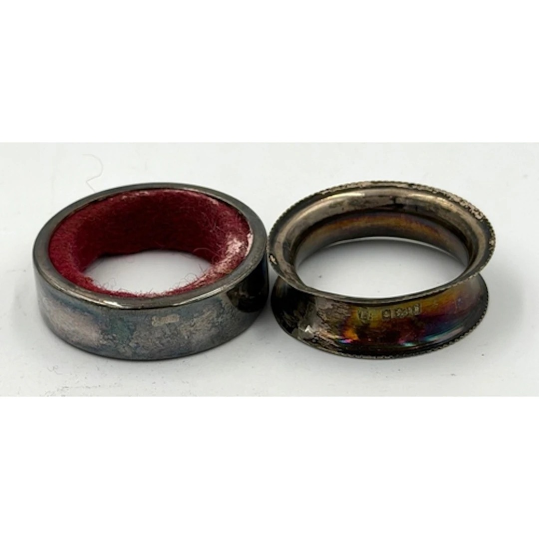 A hallmarked silver napkin ring along with a Continental sil...