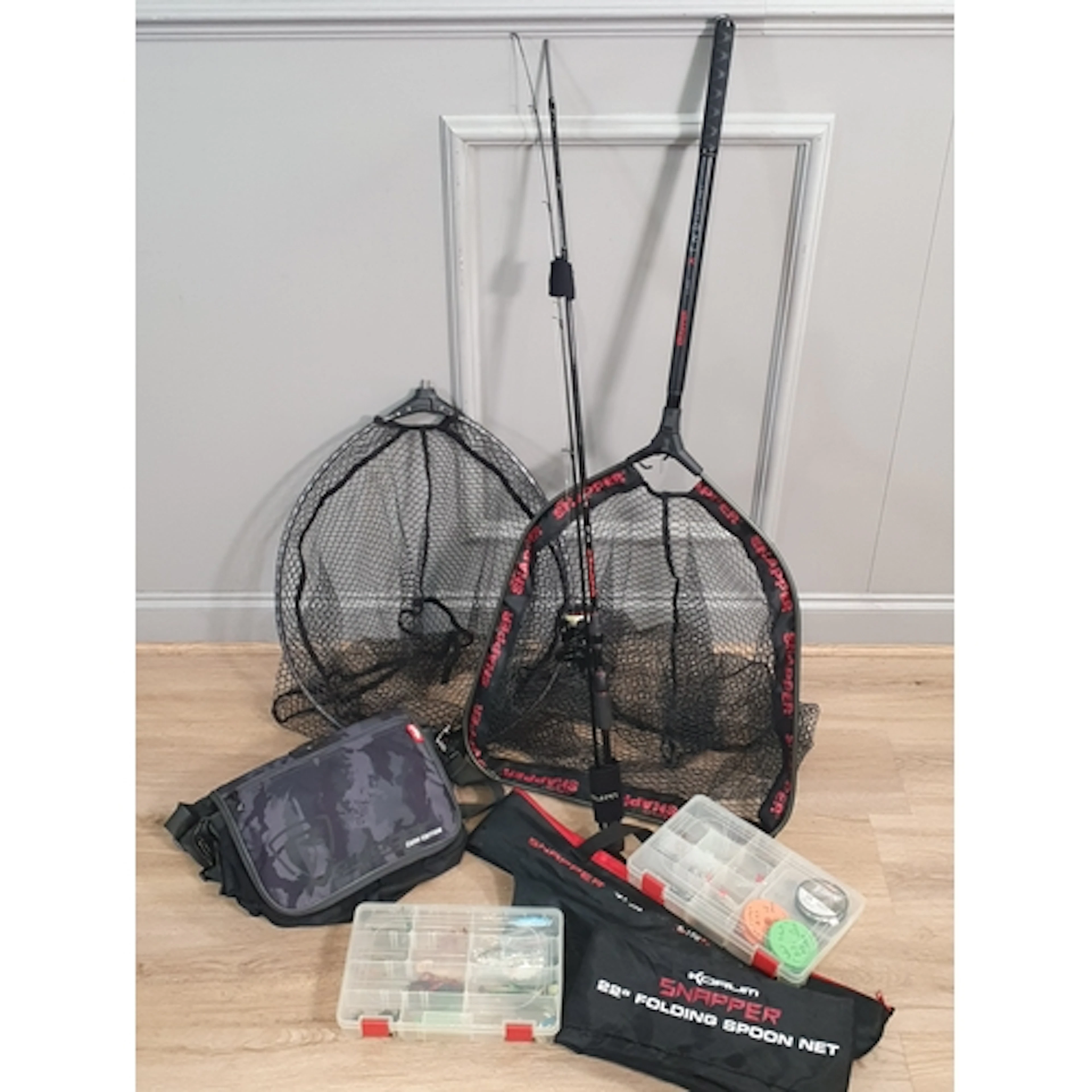 A Korum Snapper 7ft Jig 5-15g Fishing Rod and a Korum Snappe...