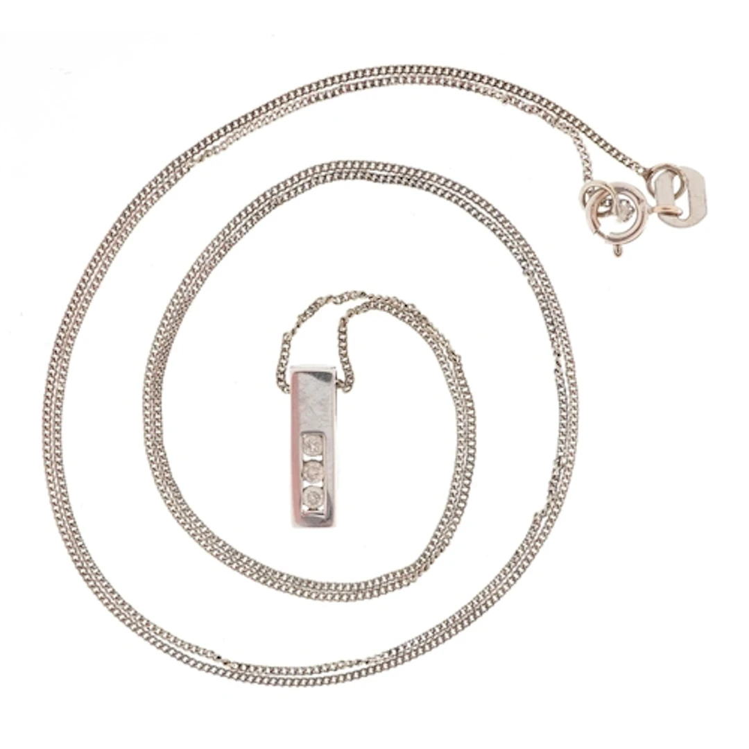 9ct white gold diamond pendant on a 9ct white gold necklace,...