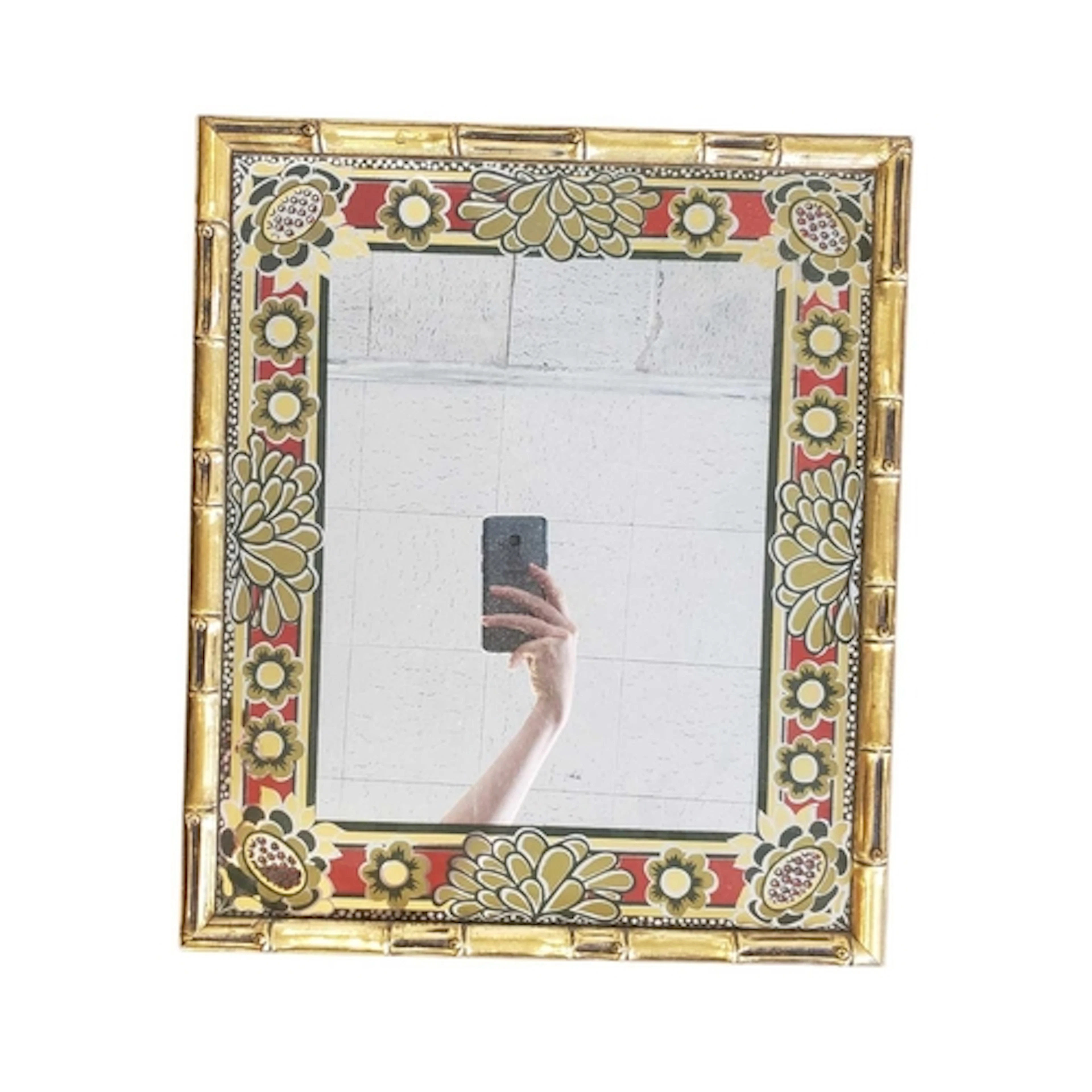 A 20th century retro wall mirror. The mirror having gilt fau...