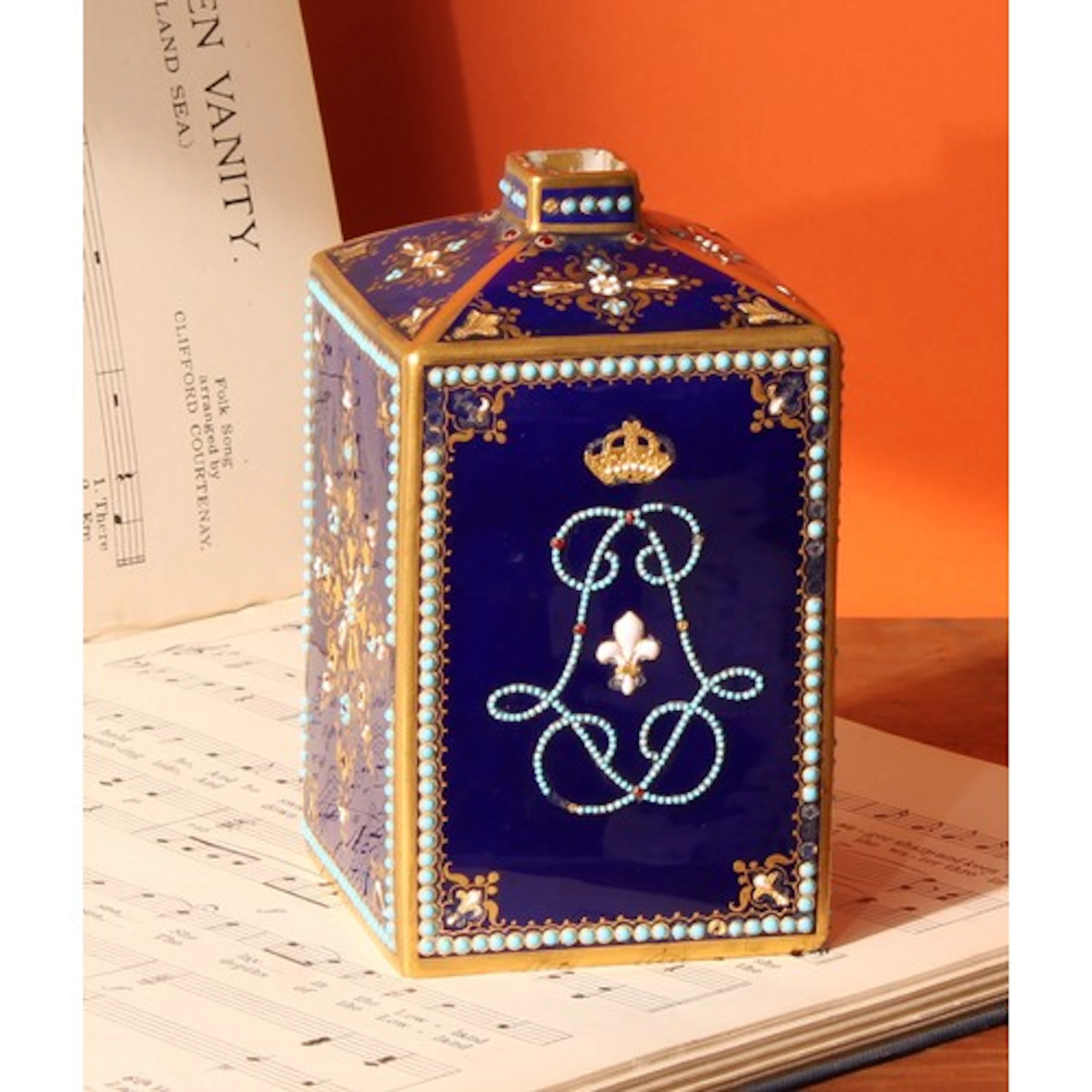 A Sevres porcelain rectangular scent bottle, three sides dec...