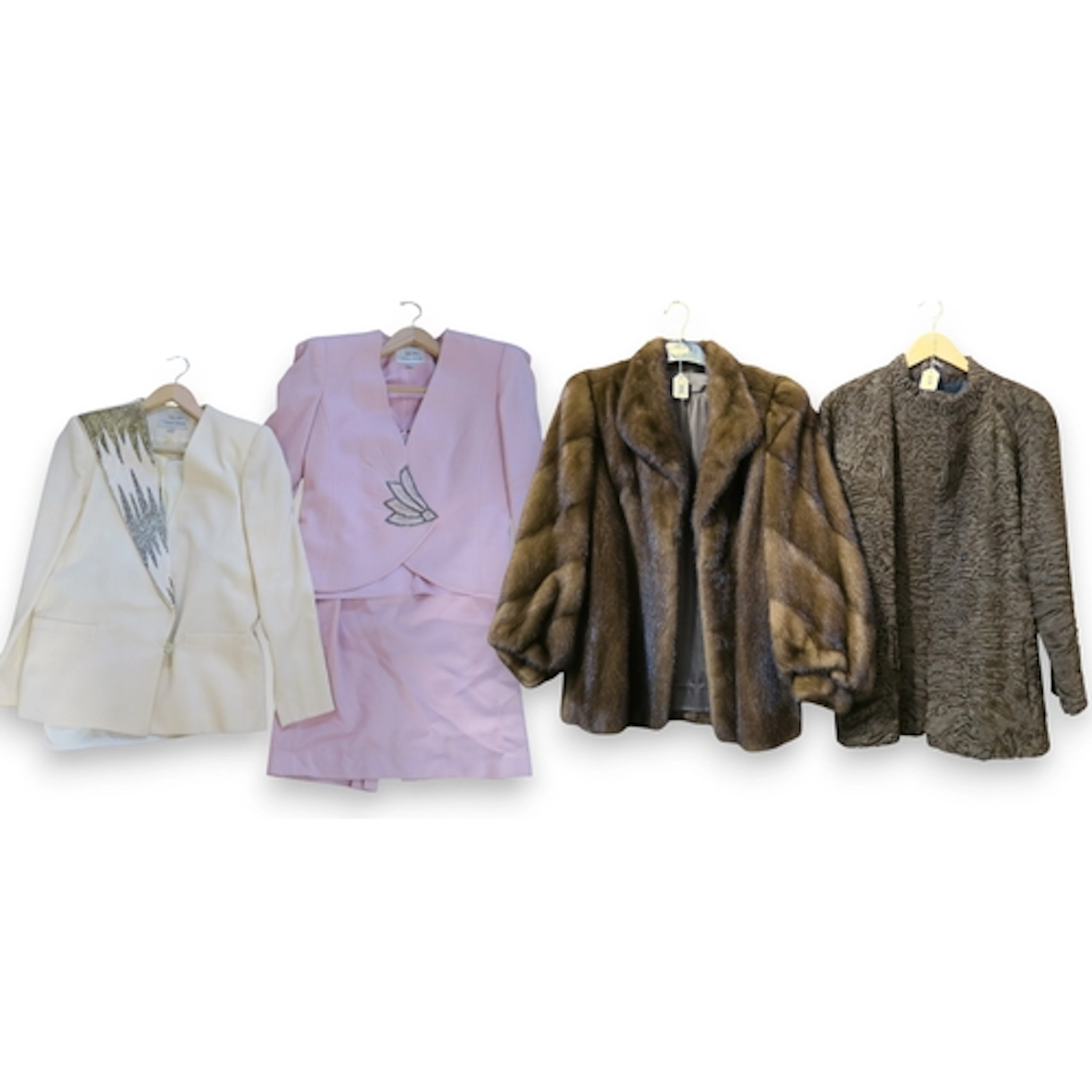 A mink fur jacket and an Astrakhan Persian lamb jacket, with...