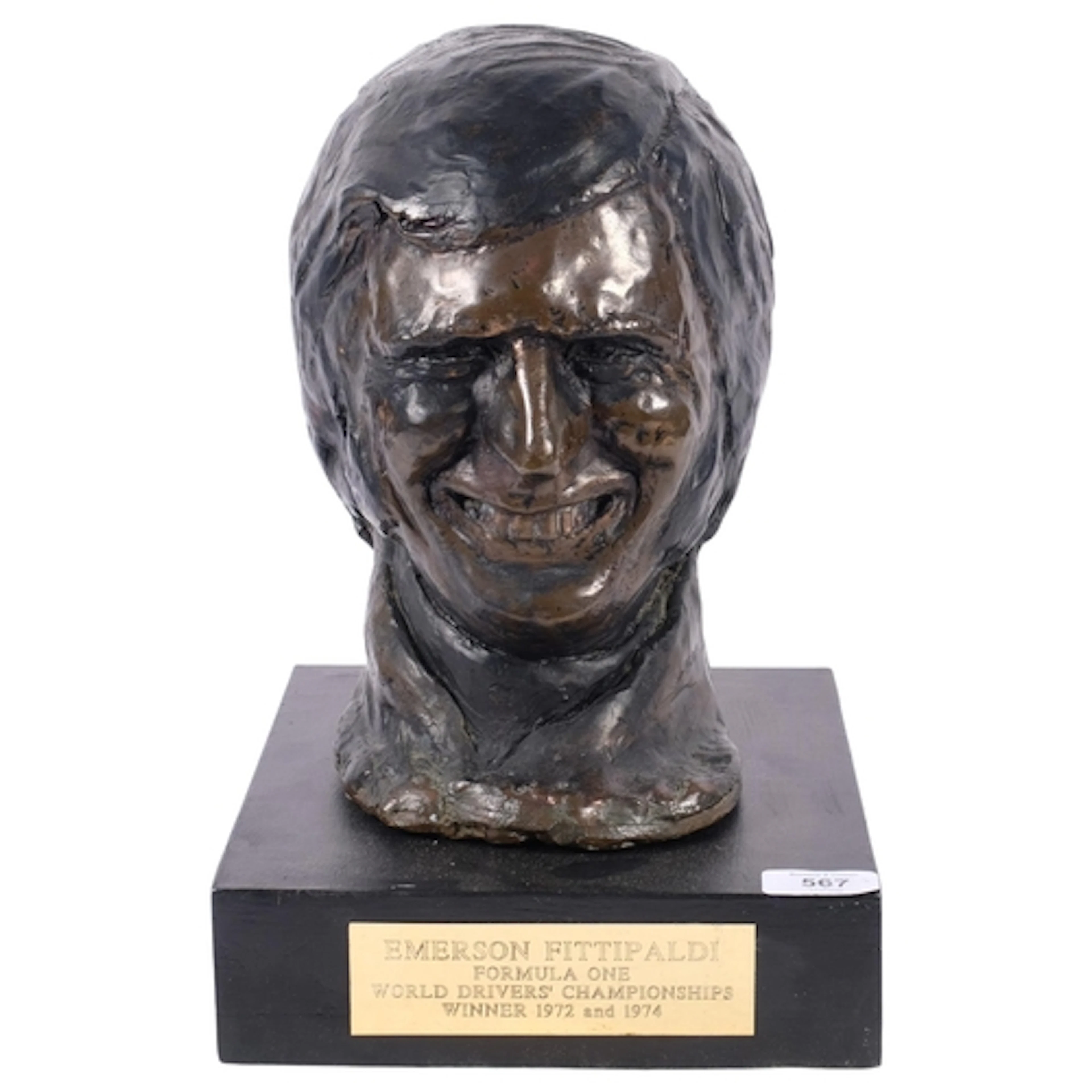 LEIGH MIDDLETON A bronze head of Emerson Fittipaldi, Formula...