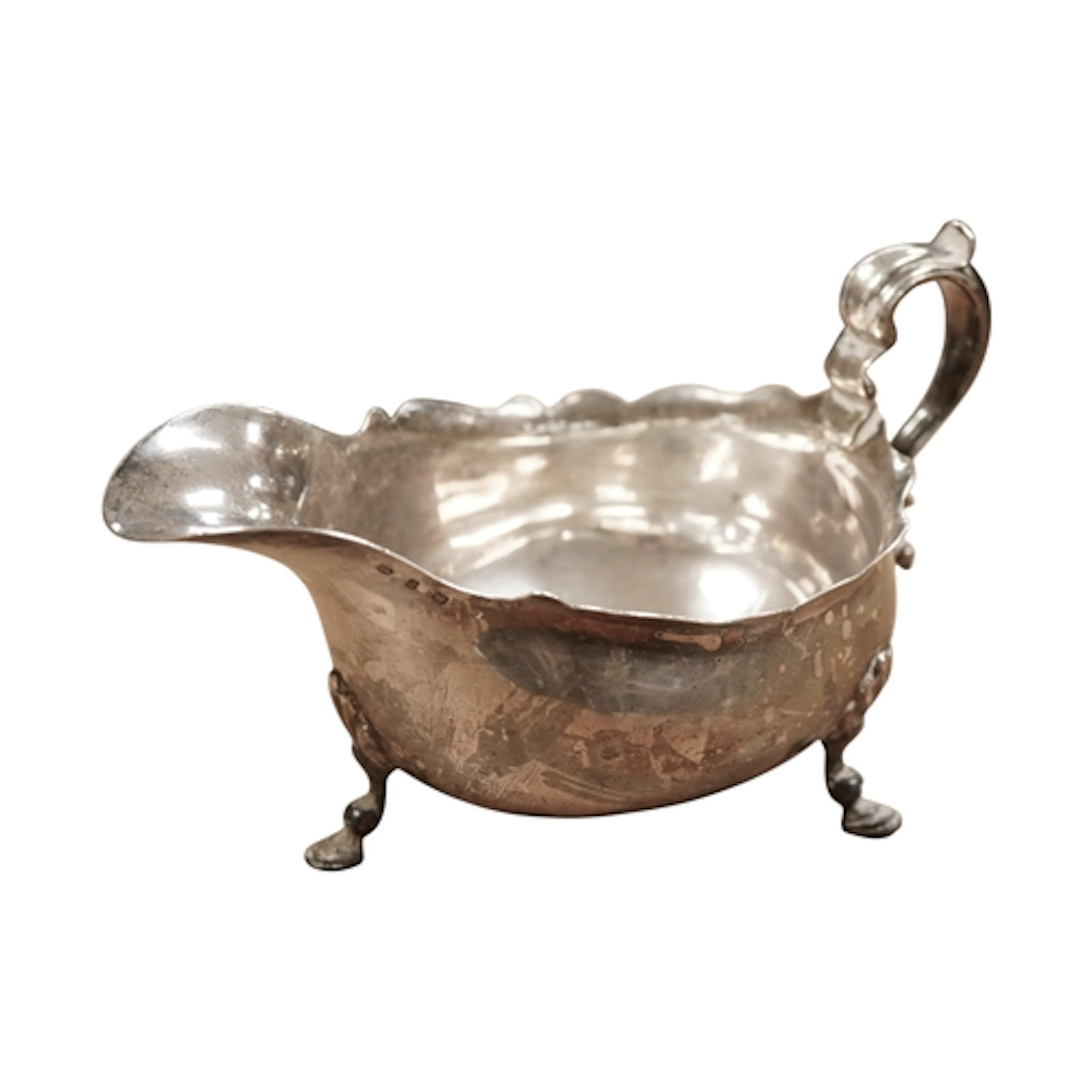 A late Victorian silver sauce boat, Birmingham, 1898, length...