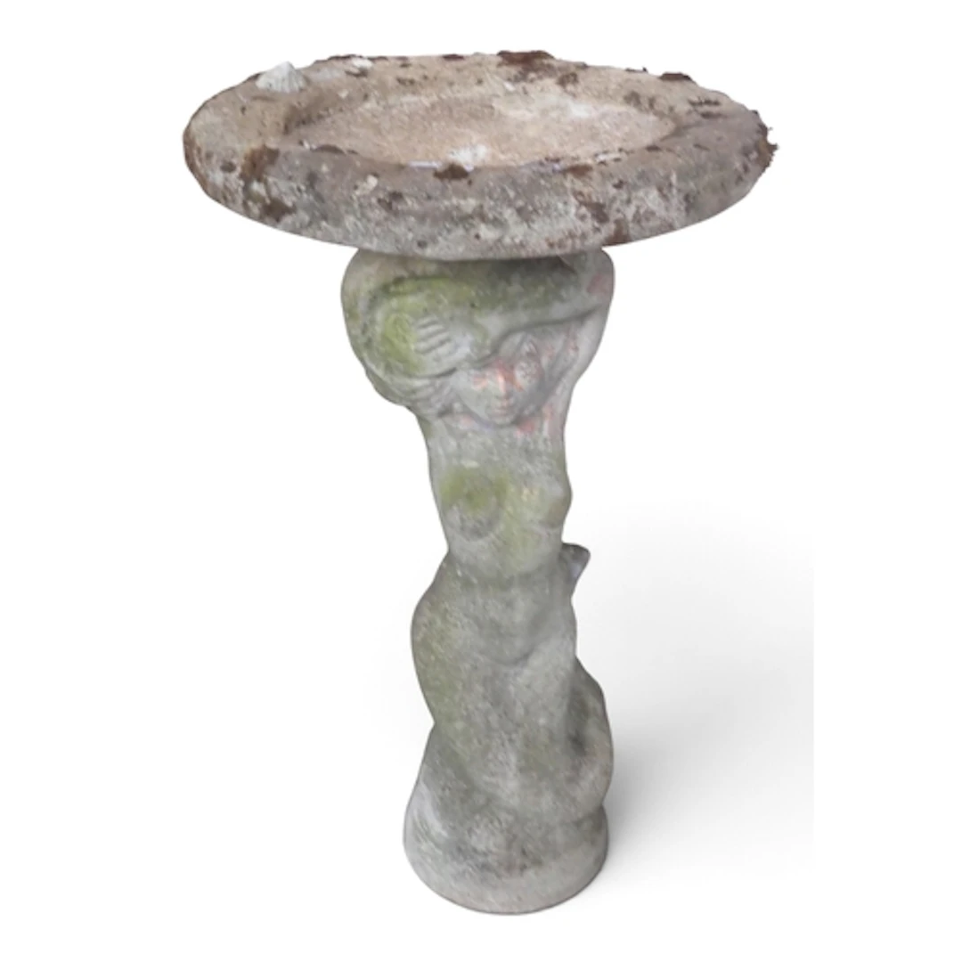A 20th century reconstituted stone birdbath with circular ba...