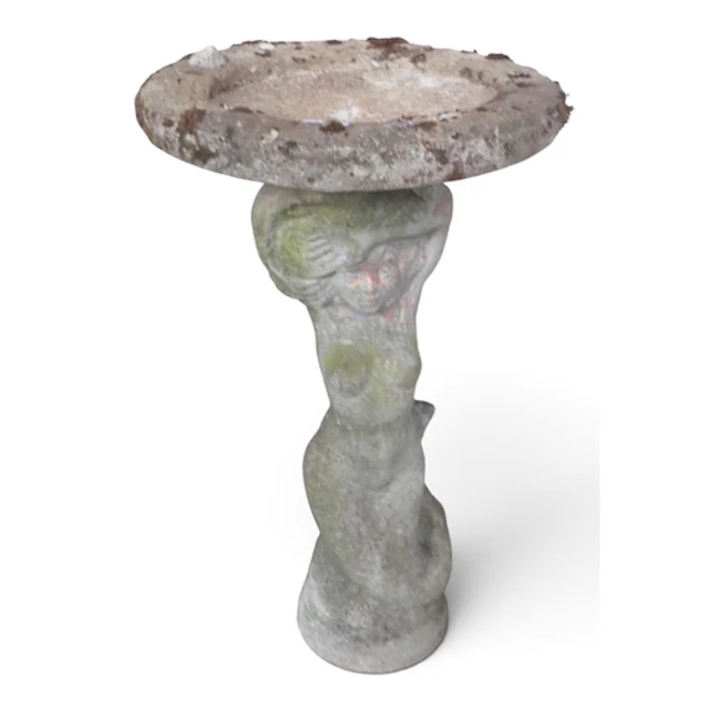 A 20th century reconstituted stone birdbath with circular ba...