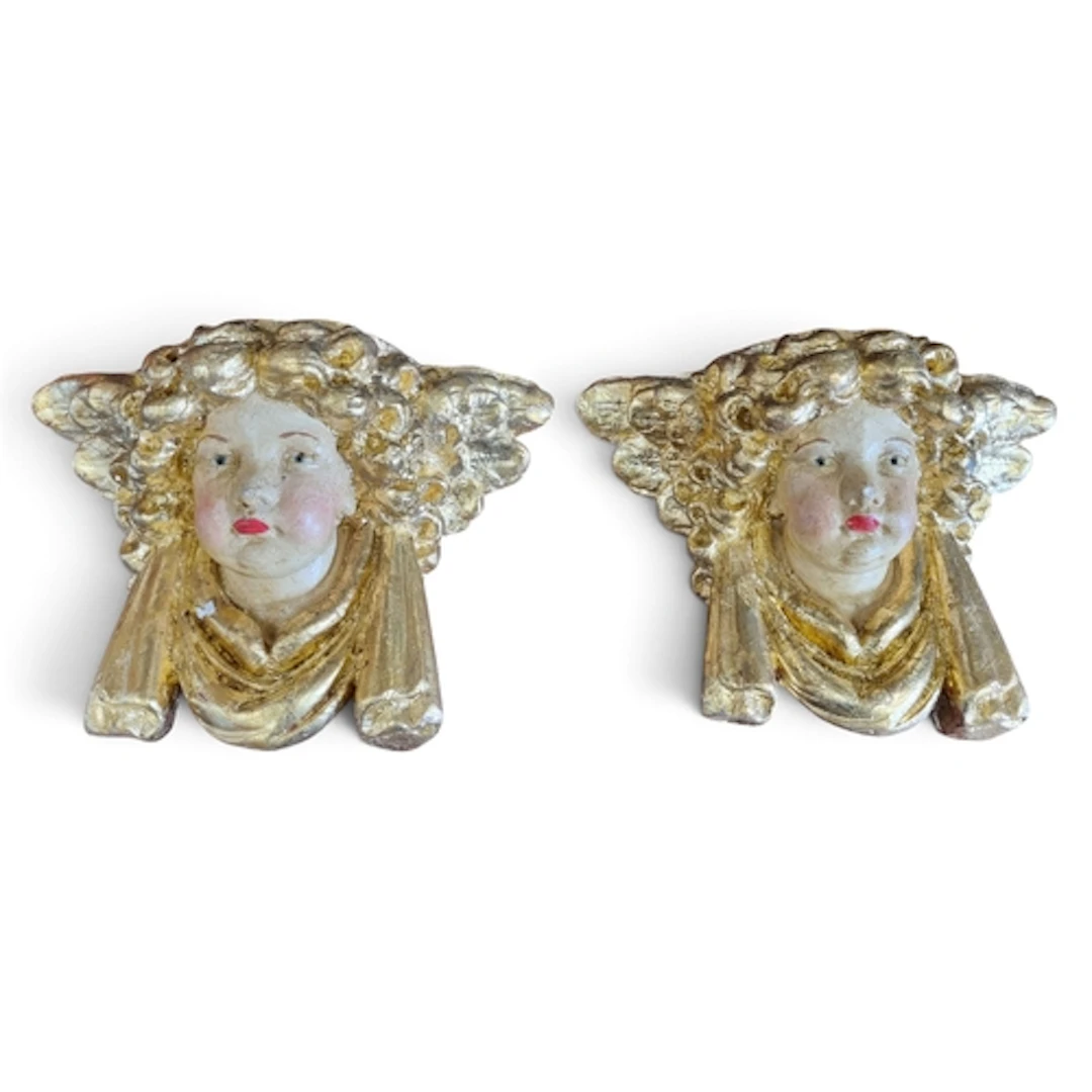 A good pair of Gilt Wall Plaques with Cherubs in the Baroque...