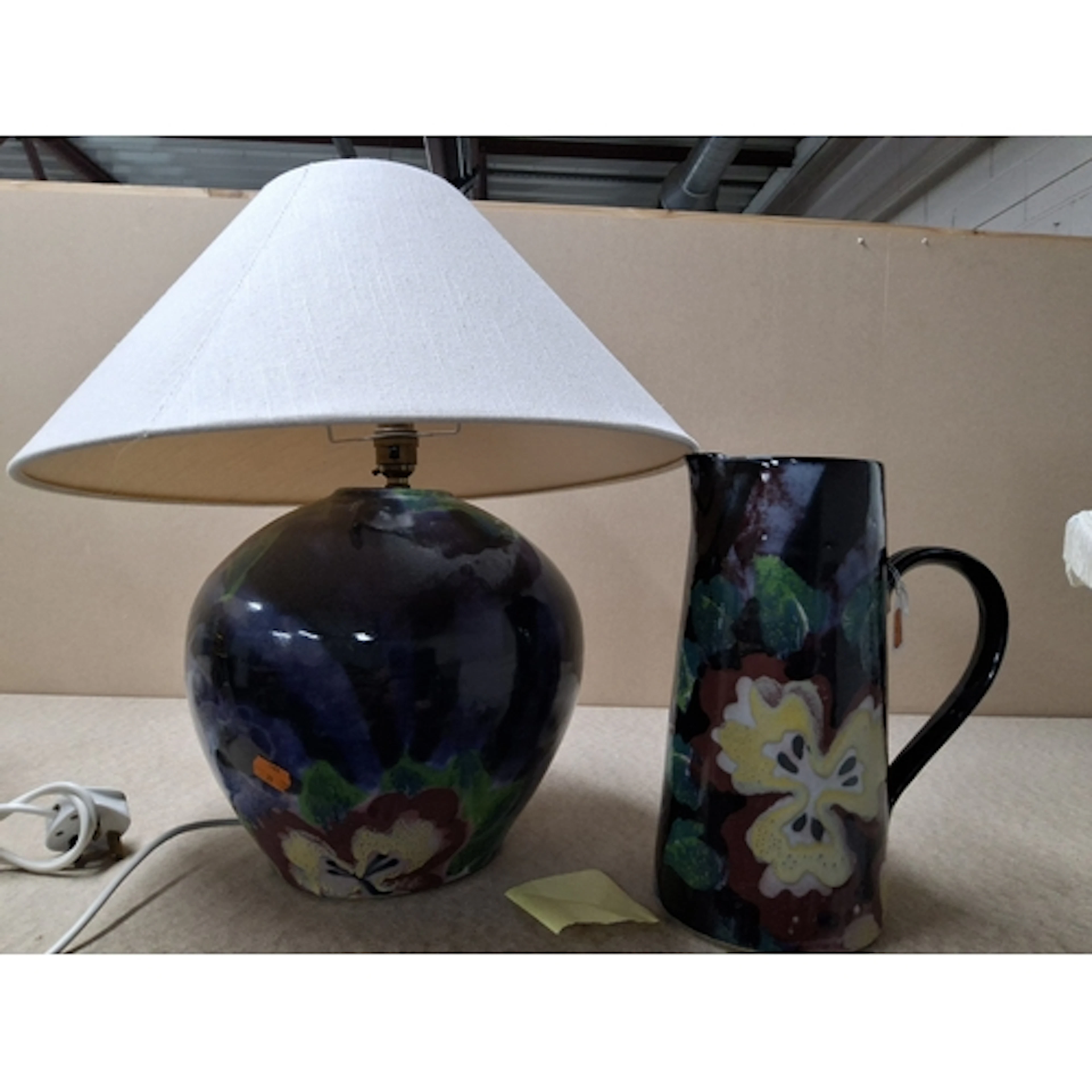 A PAIR OF MATCHING DARTINGTON POTTERY PIECES comprising a ta...