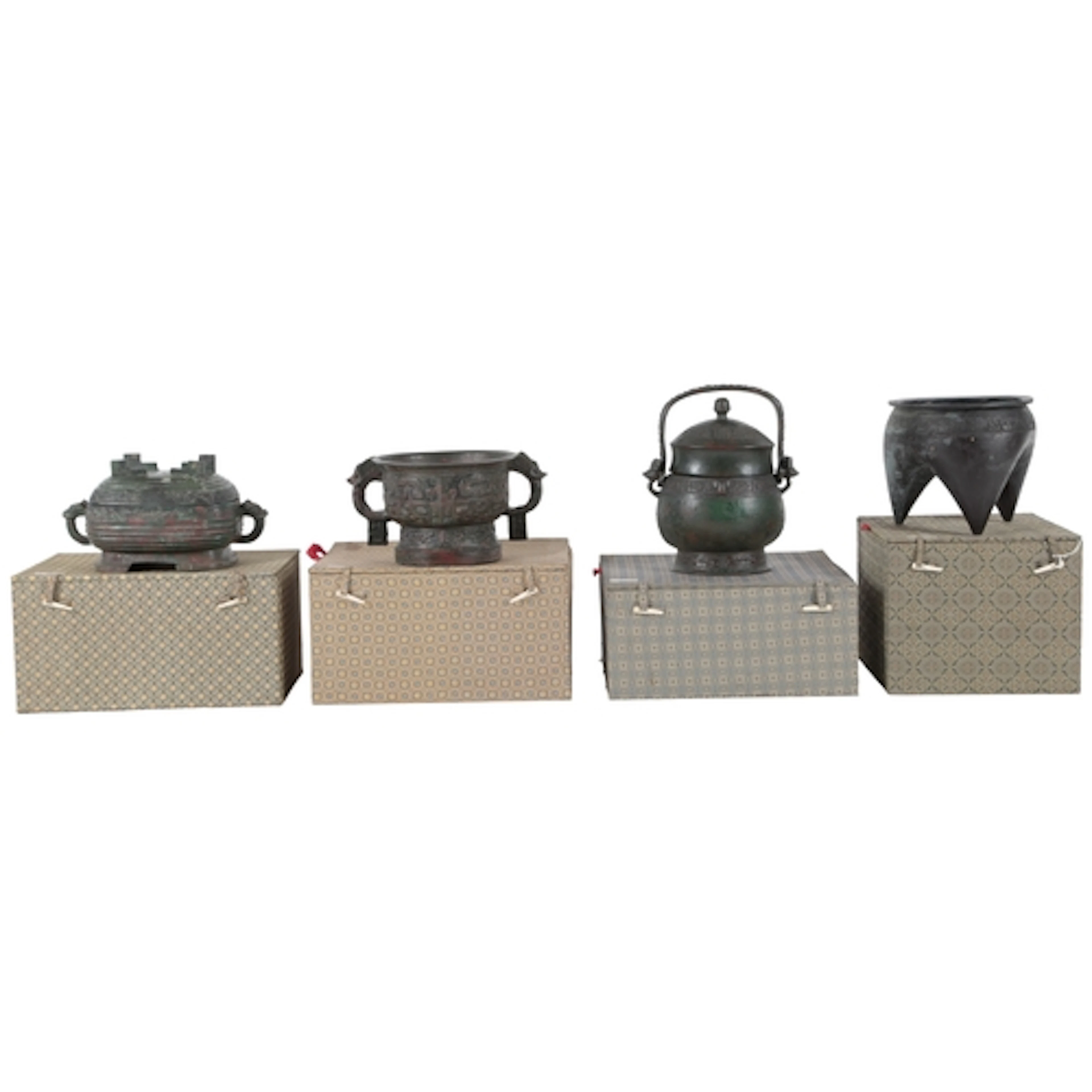 Four Chinese patinated bronze archaistic models of a Gui, Xu...
