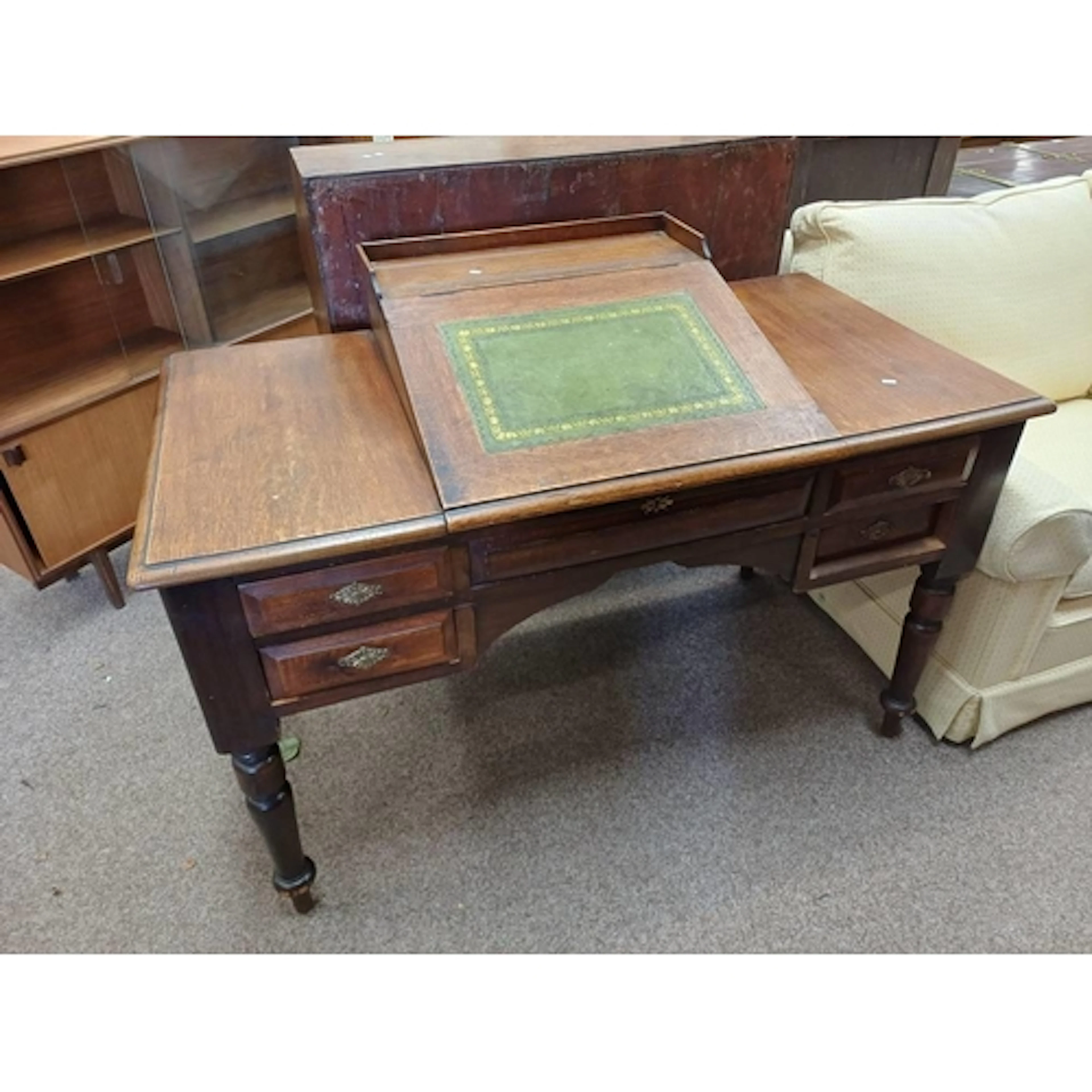 LATE 19TH OR EARLY 20TH CENTURY OAK WRITING DESK. THE CENTRA...