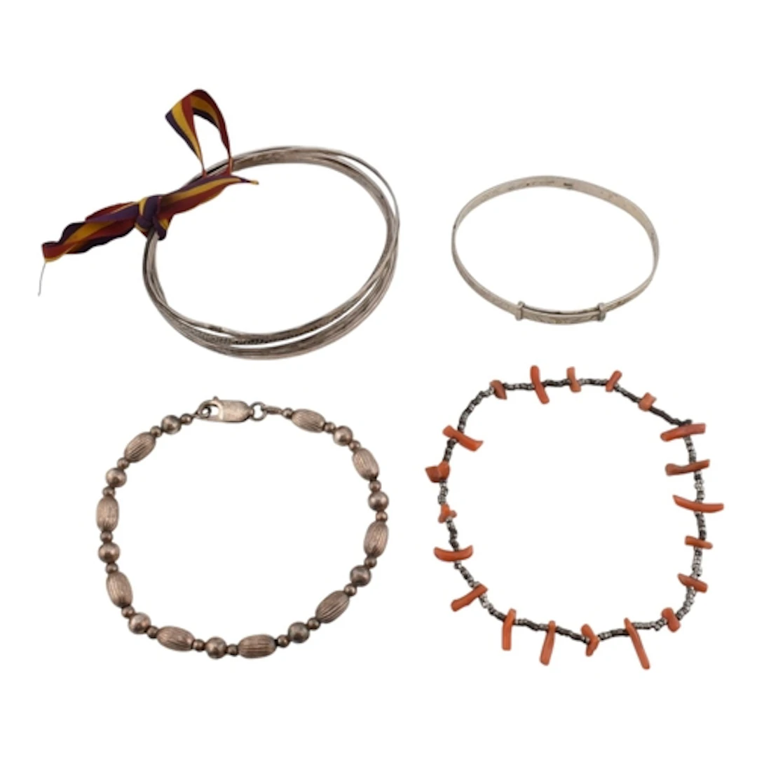 Selection of silver and white metal bracelets. Ten items to ...