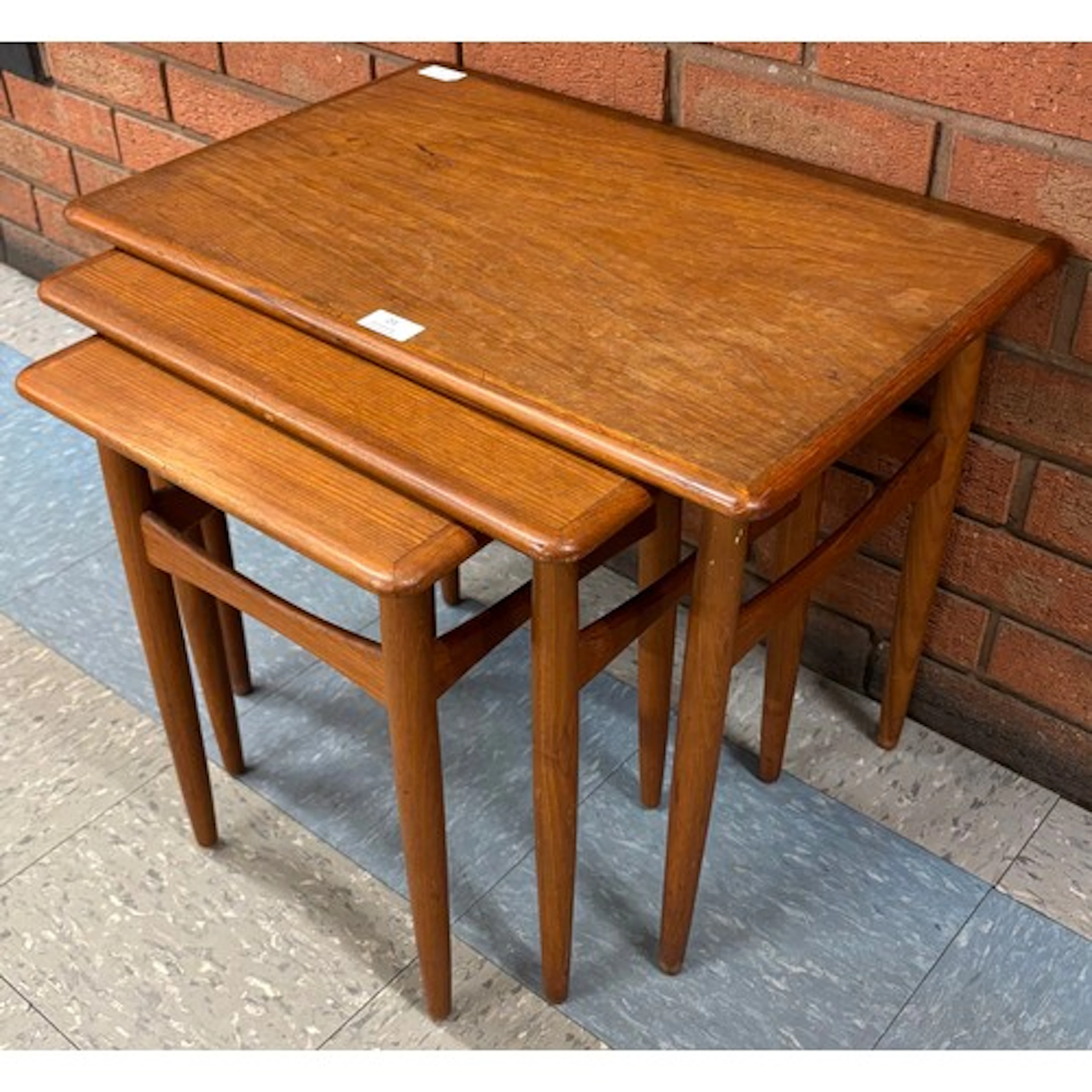 A Danish Kai Kristiansen teak nest of tables