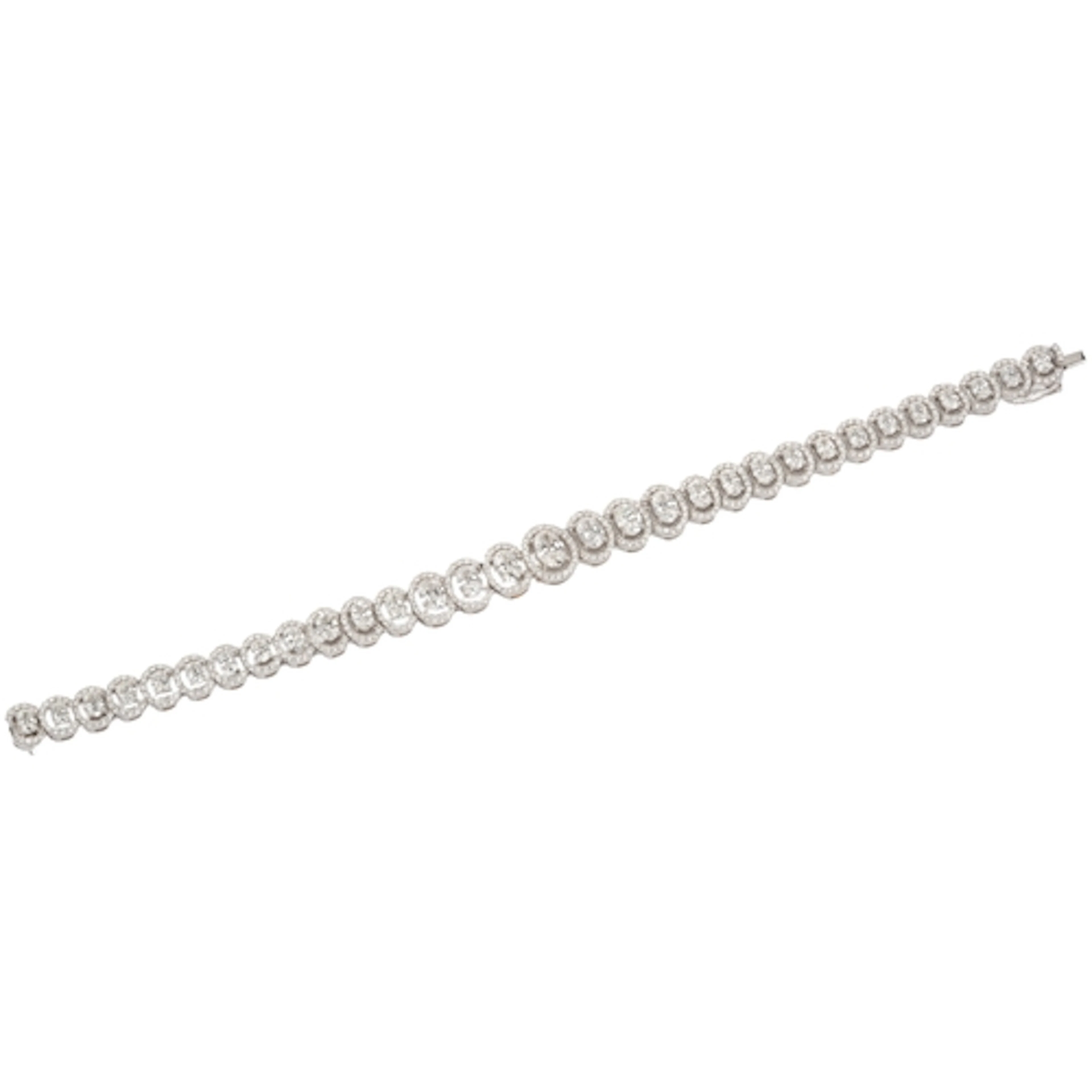 An impressive diamond bracelet, composed of links set with o...