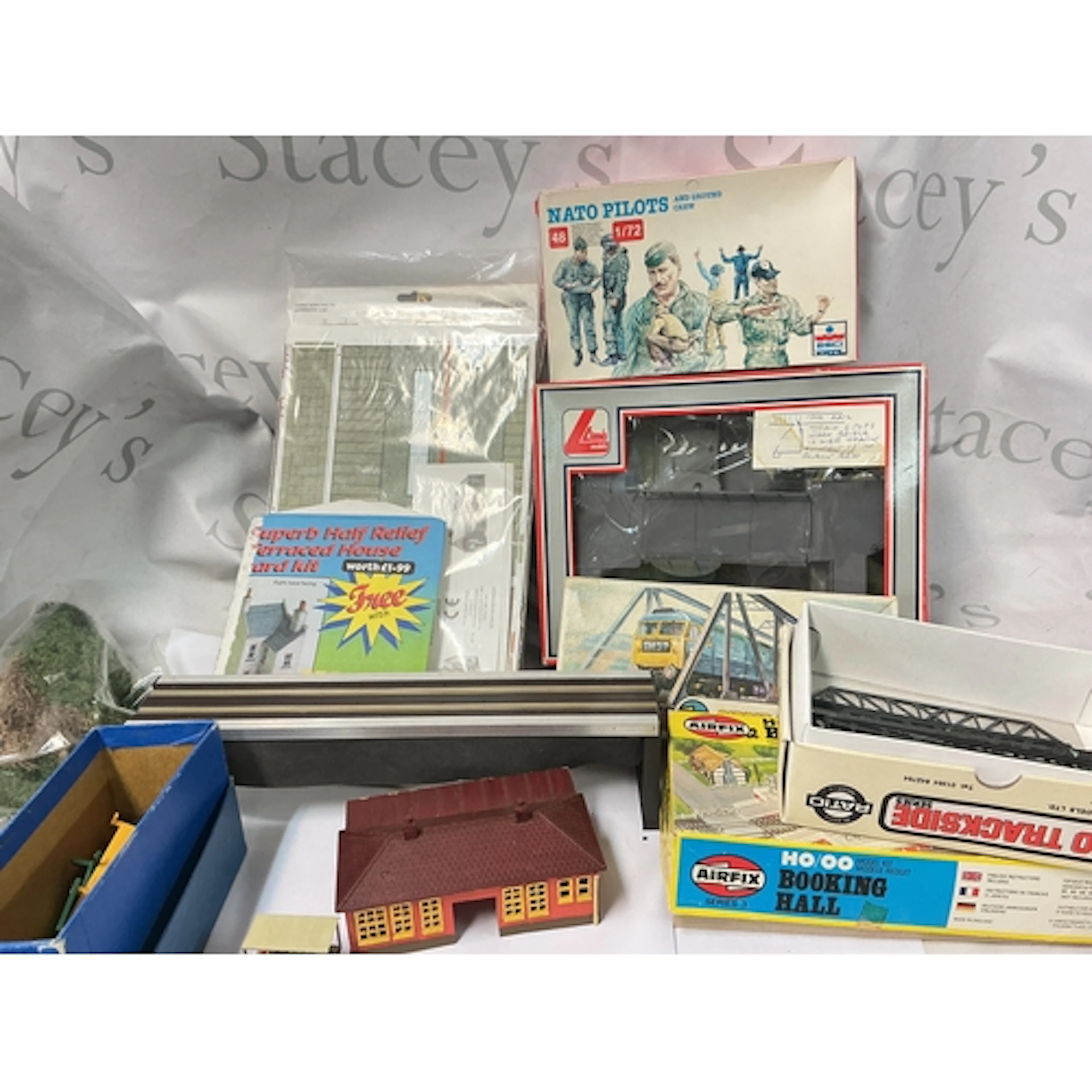 A Box Containing Built And Un Built 00 Gauge Model Kits And ...
