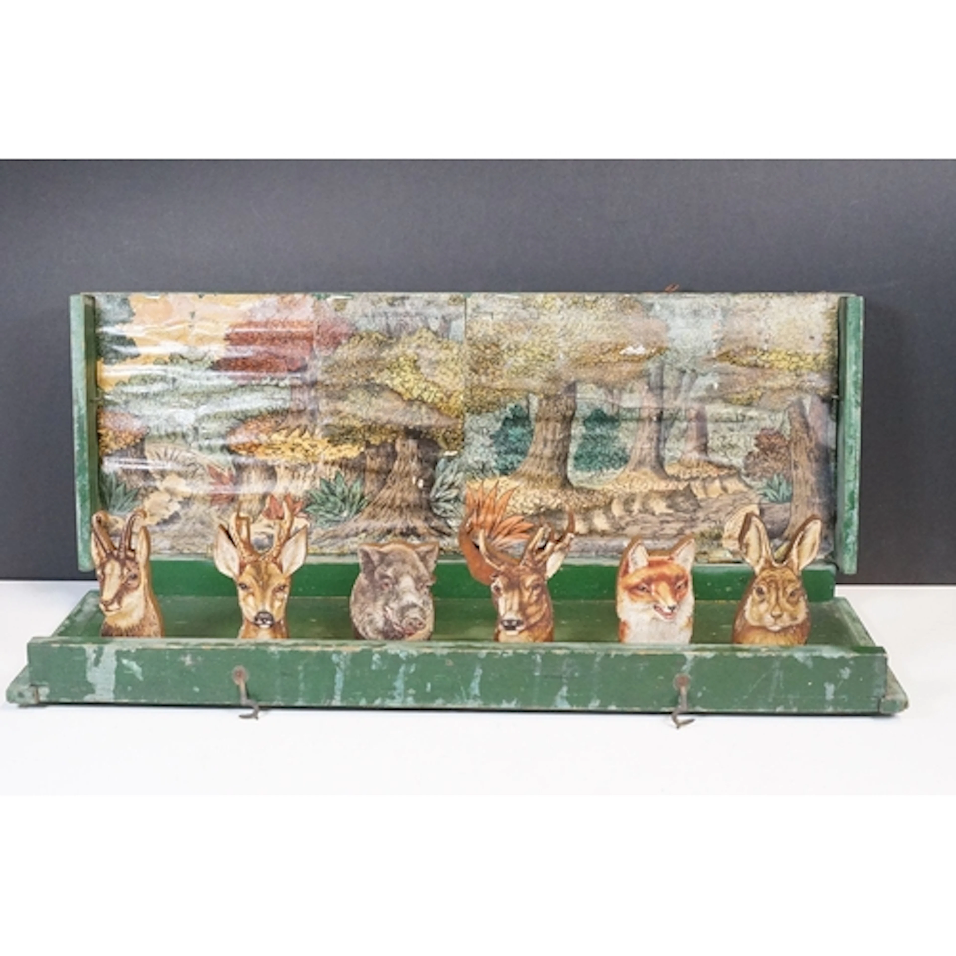 A Vintage shooting gallery, wooden construction with six fol...