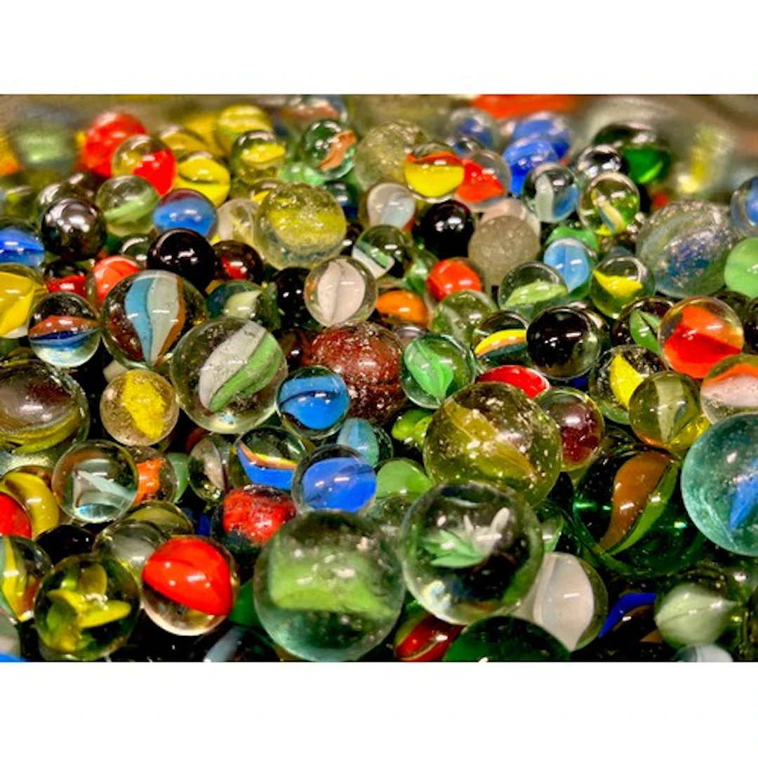 A collection of vintage marbles, cat-eye, etc.