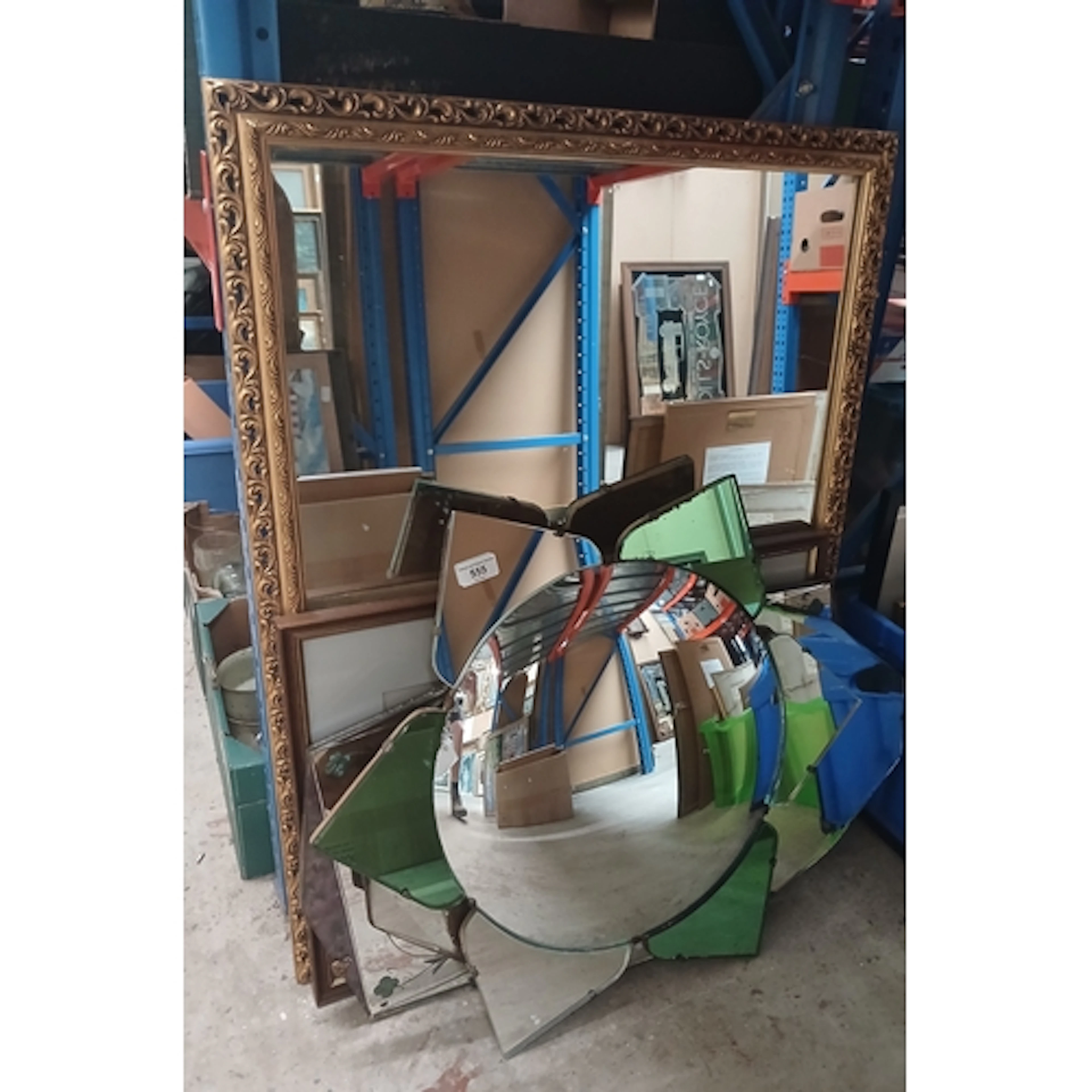 An Art Deco mirror, three others and a print.