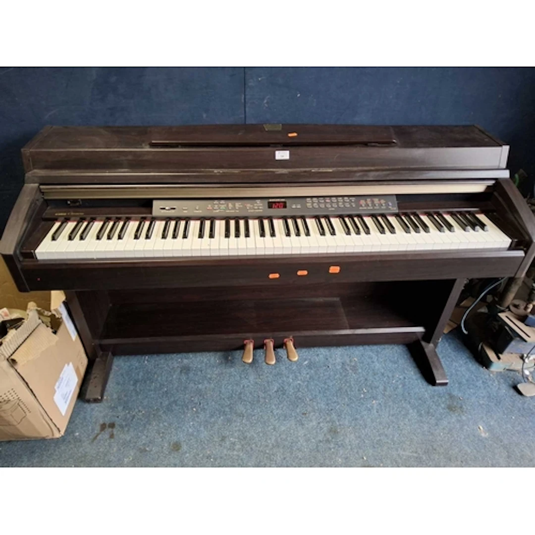 A YAMAHA CLAVINOVA CLP-240 ELECTRONIC PIANO with a rosewood ...
