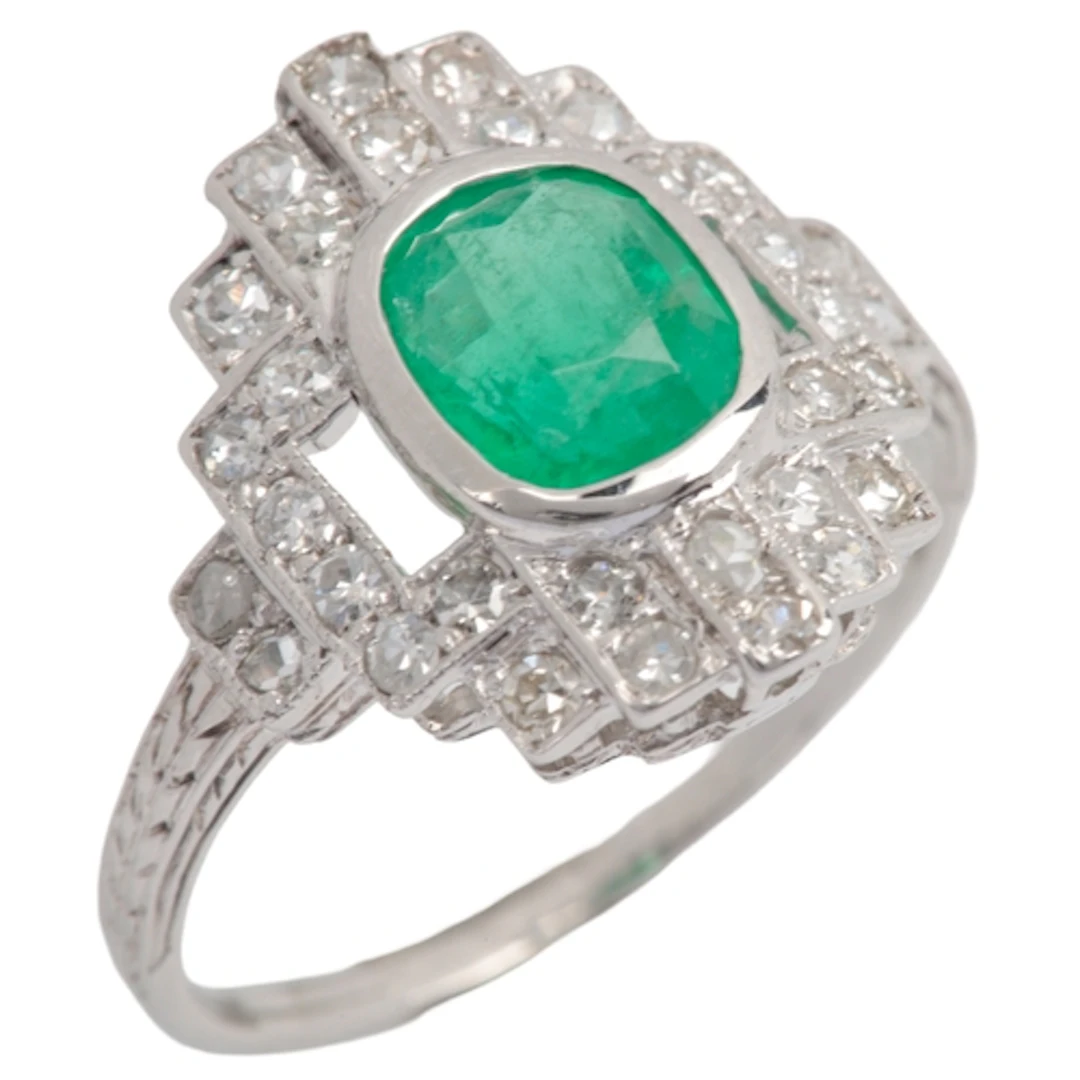 An Art Deco emerald and diamond ring, 1920s, collet-set with...