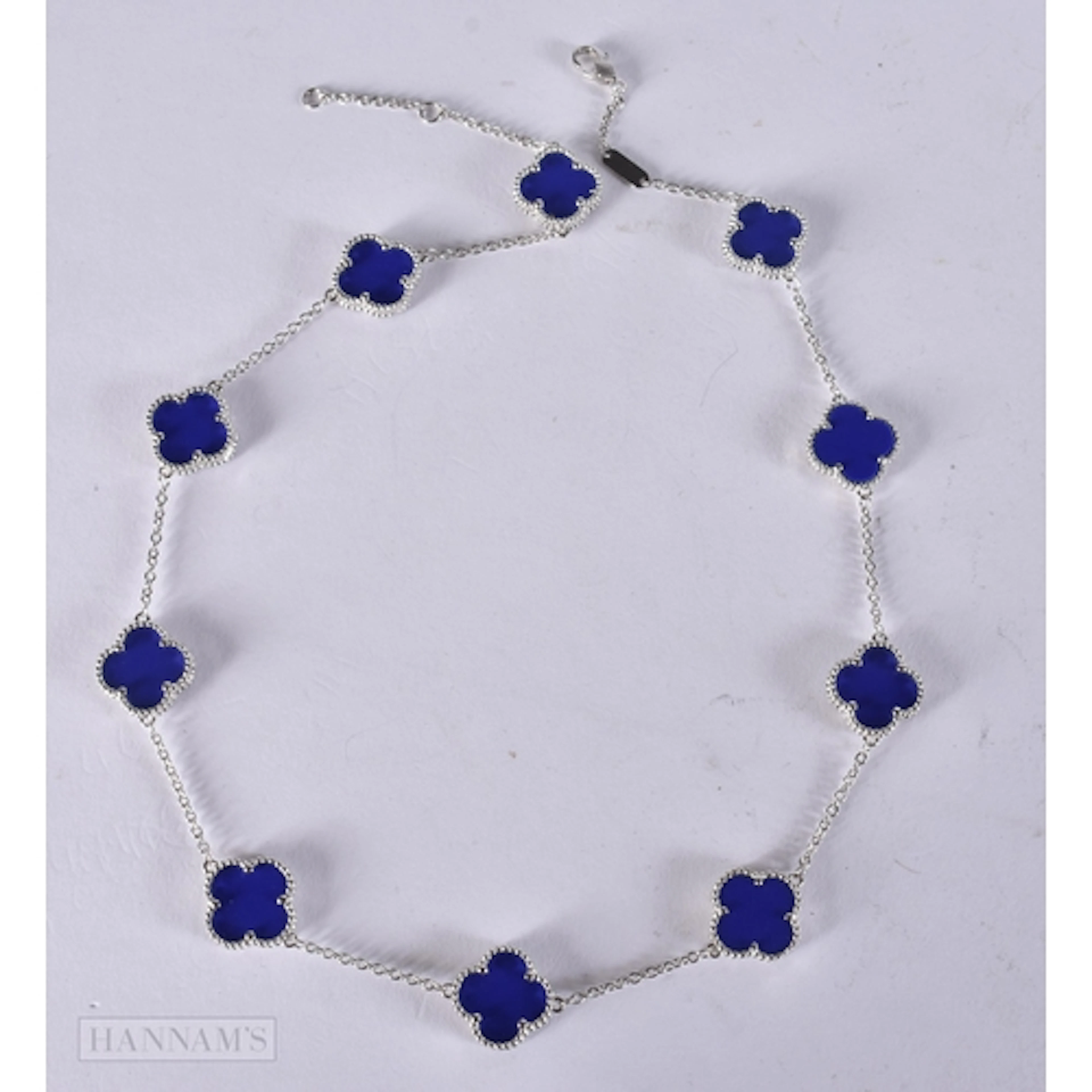 A SILVER AND BLUE ONYX CLOVER NECKLACE. 45.5 cm. 14.3 grams
