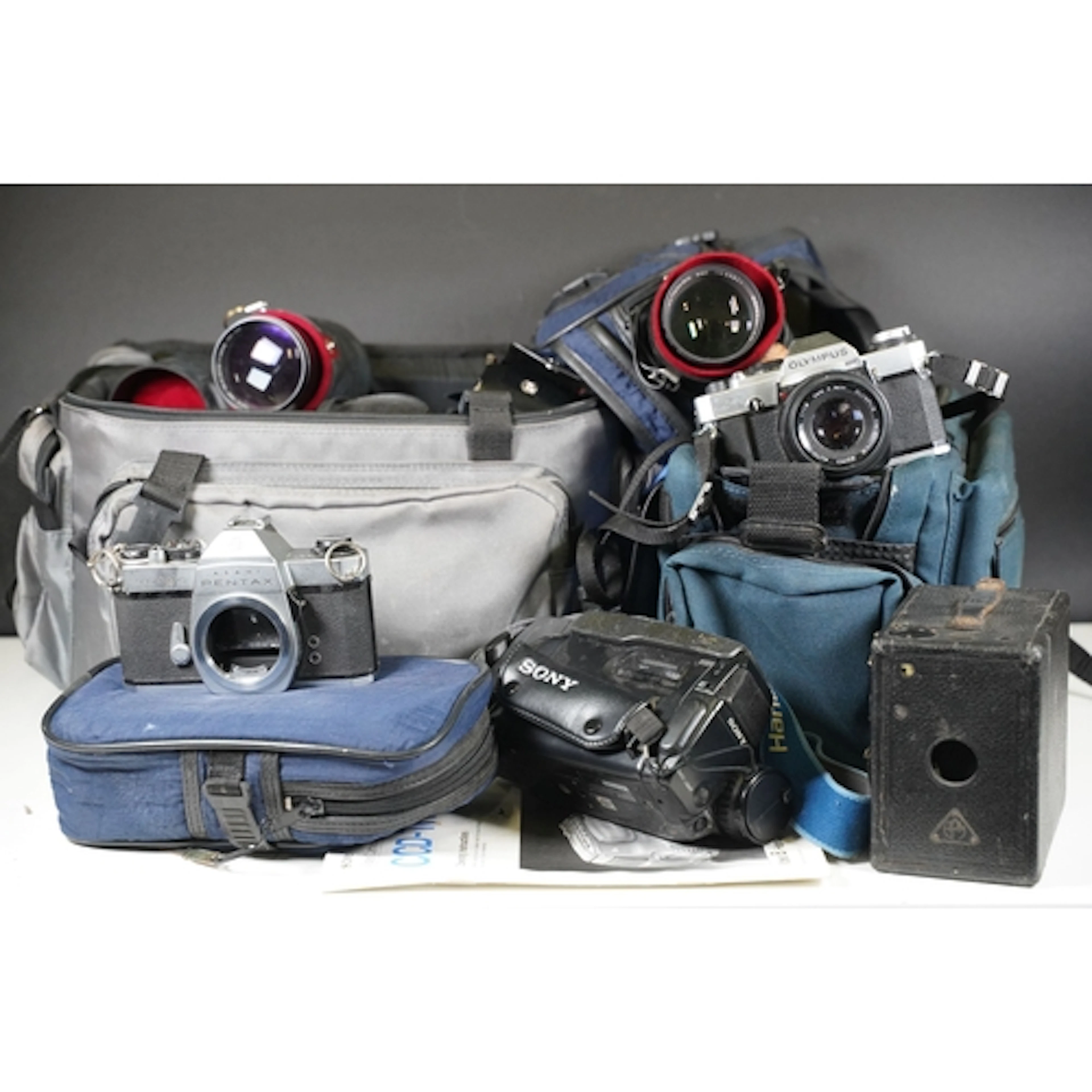 Olympus OM20 camera fitted with Olympus 1:1.8 lens, Asahi Pe...