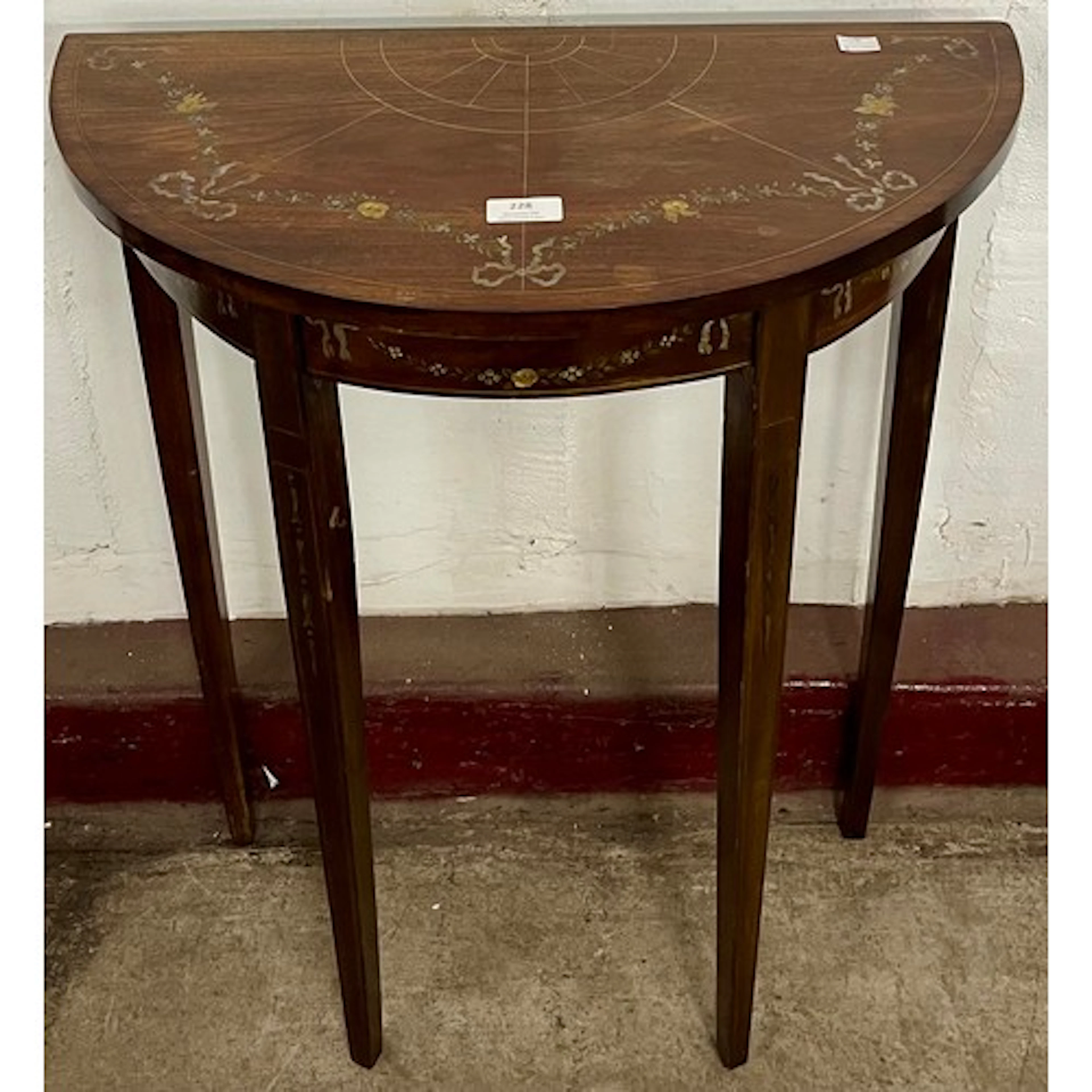 An Edward VII inlaid mahogany demi-lune hall table