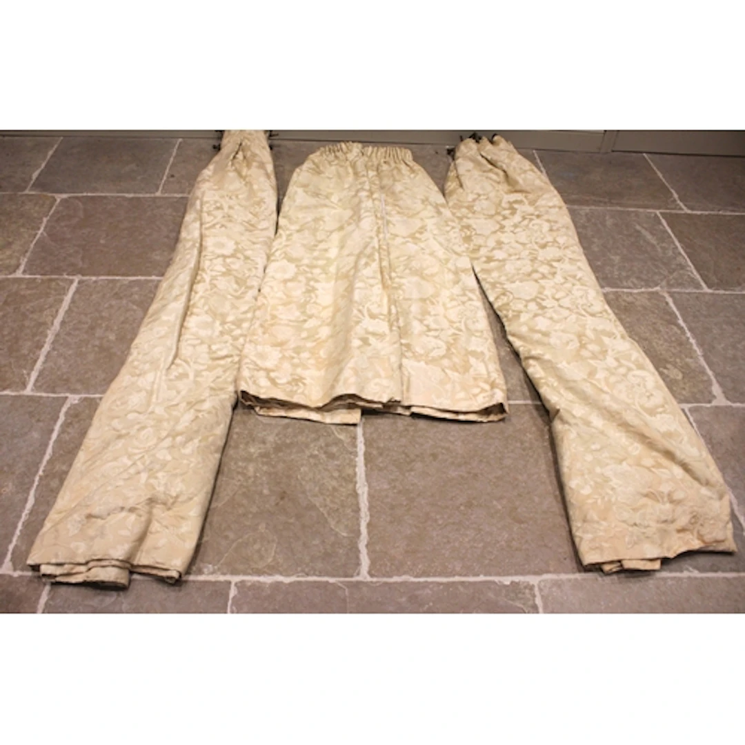 A pair of ivory coloured floral jacquard fabric interlined c...