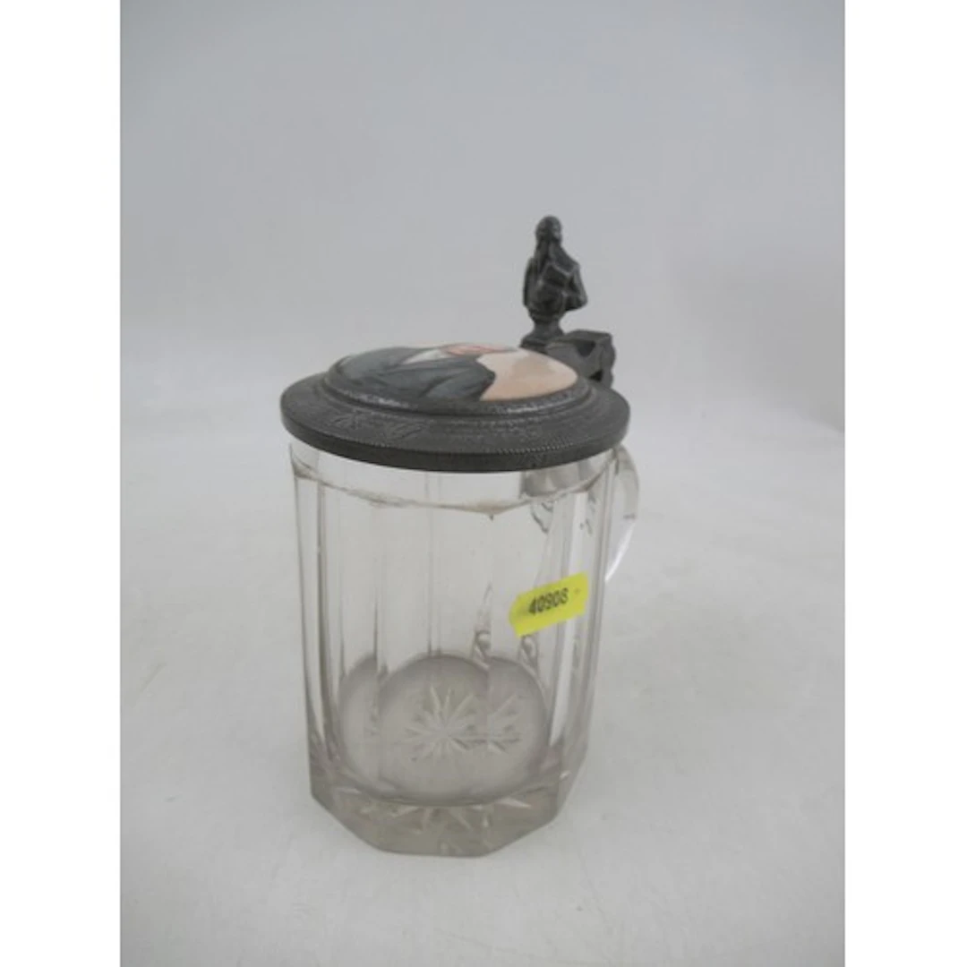 A continental glass tankard, the pewter cover inset with a p...