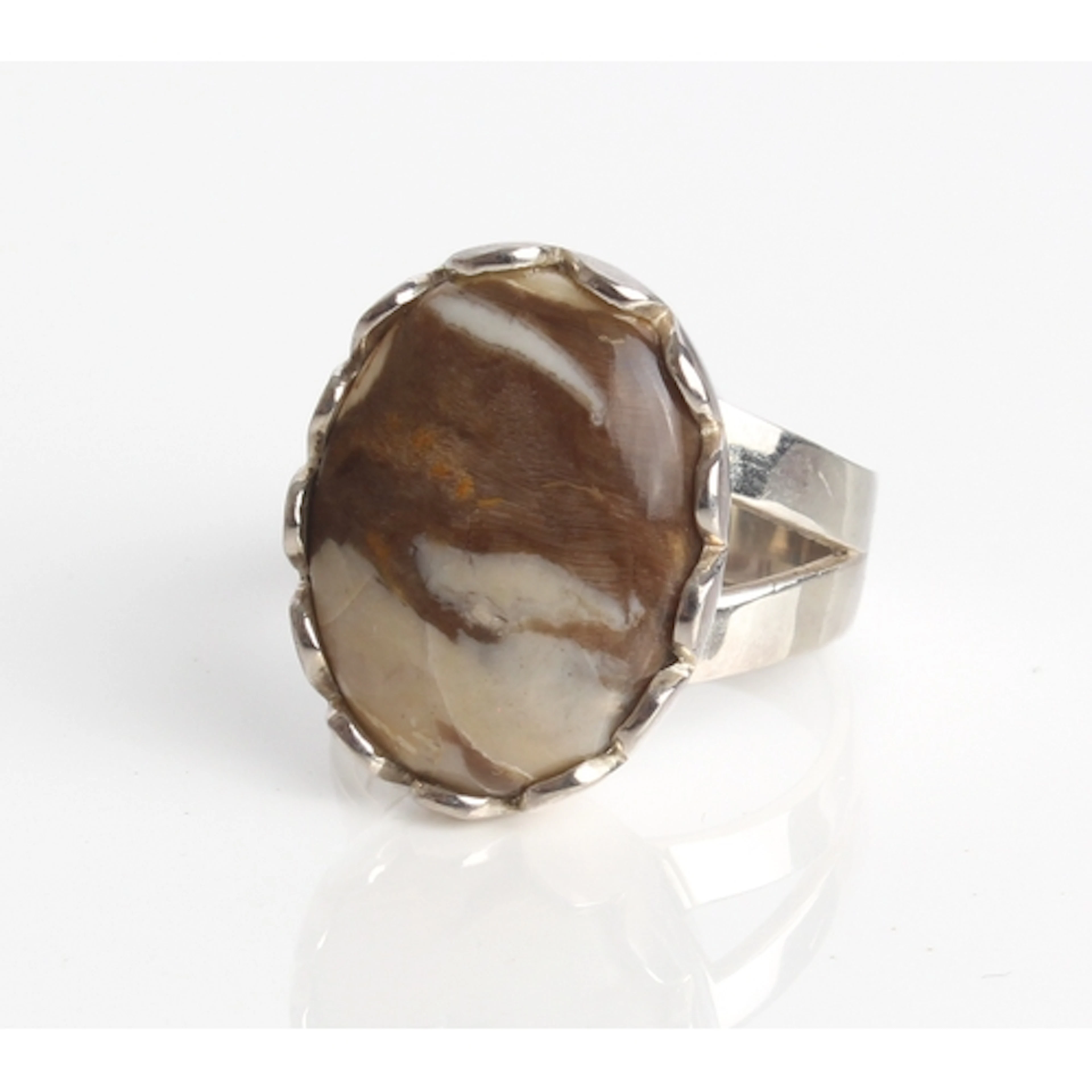A fossilised peanut wood and sterling silver ring - with a 1...