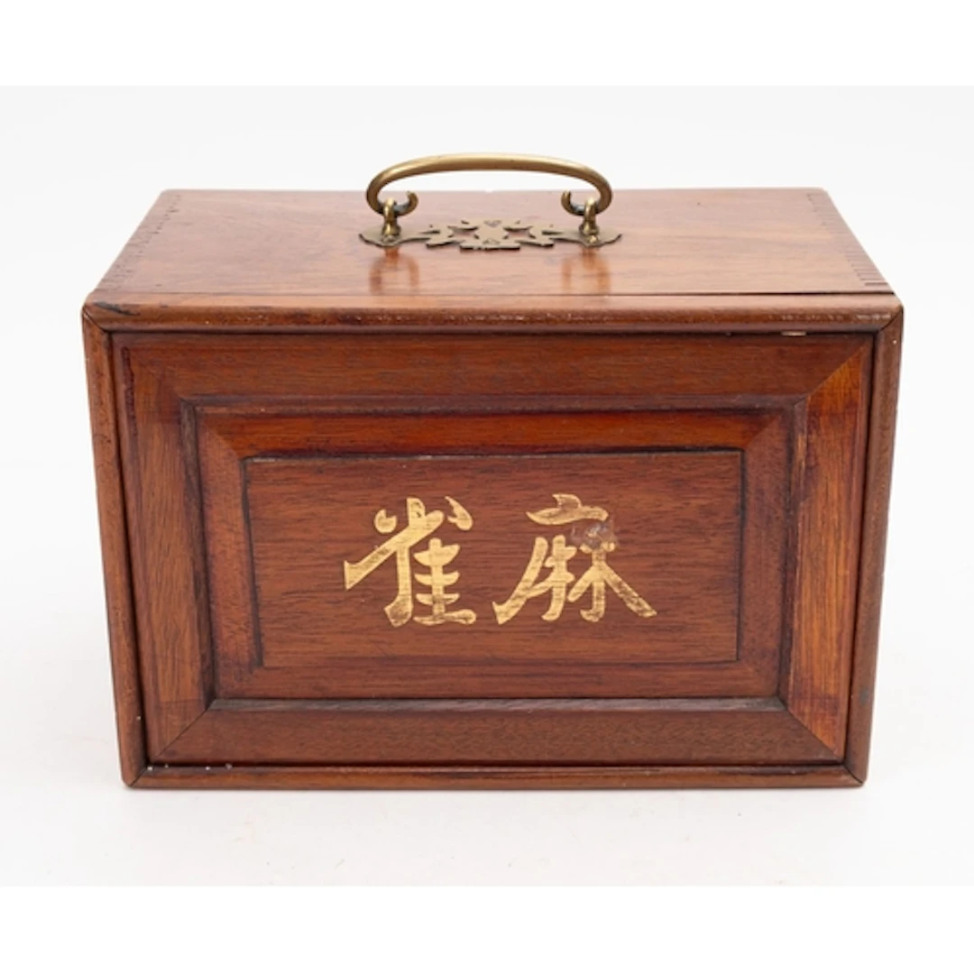 A mid 20th Century mahogany cased Mah Jong set. Together wit...